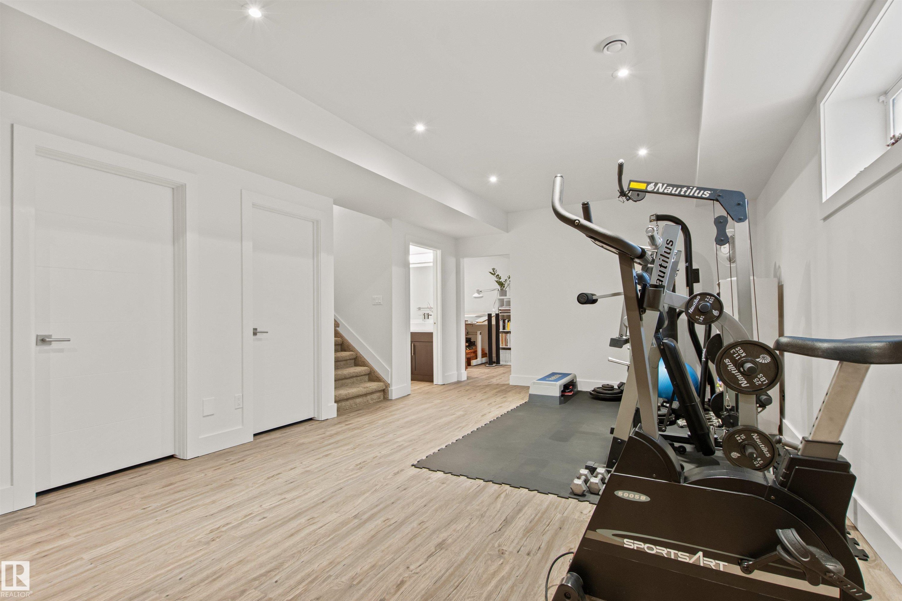 Edmonton, AB - Indoor Photo Showing Gym Room