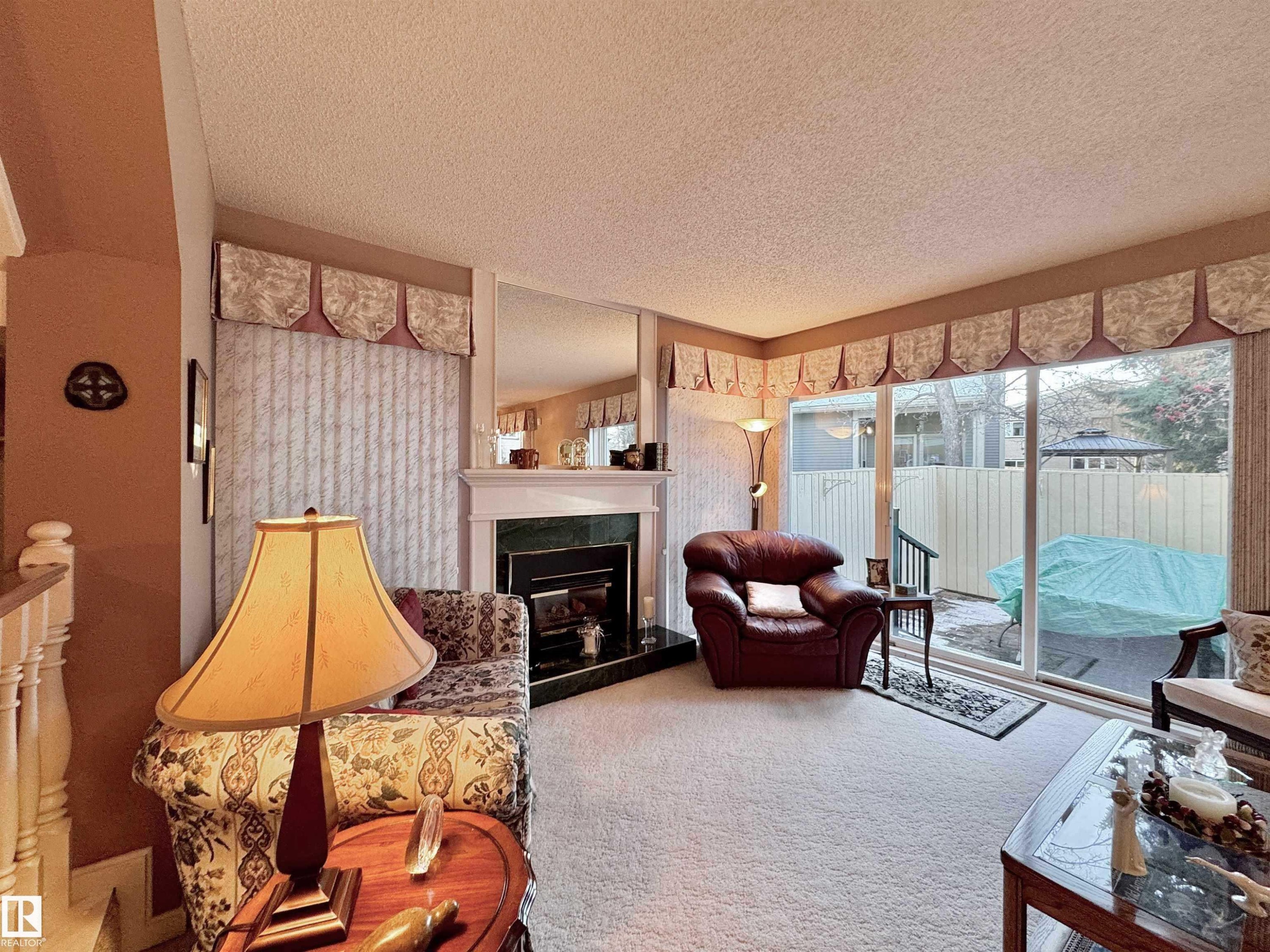 1057 109 Street, Edmonton, AB - Indoor Photo Showing Living Room With Fireplace