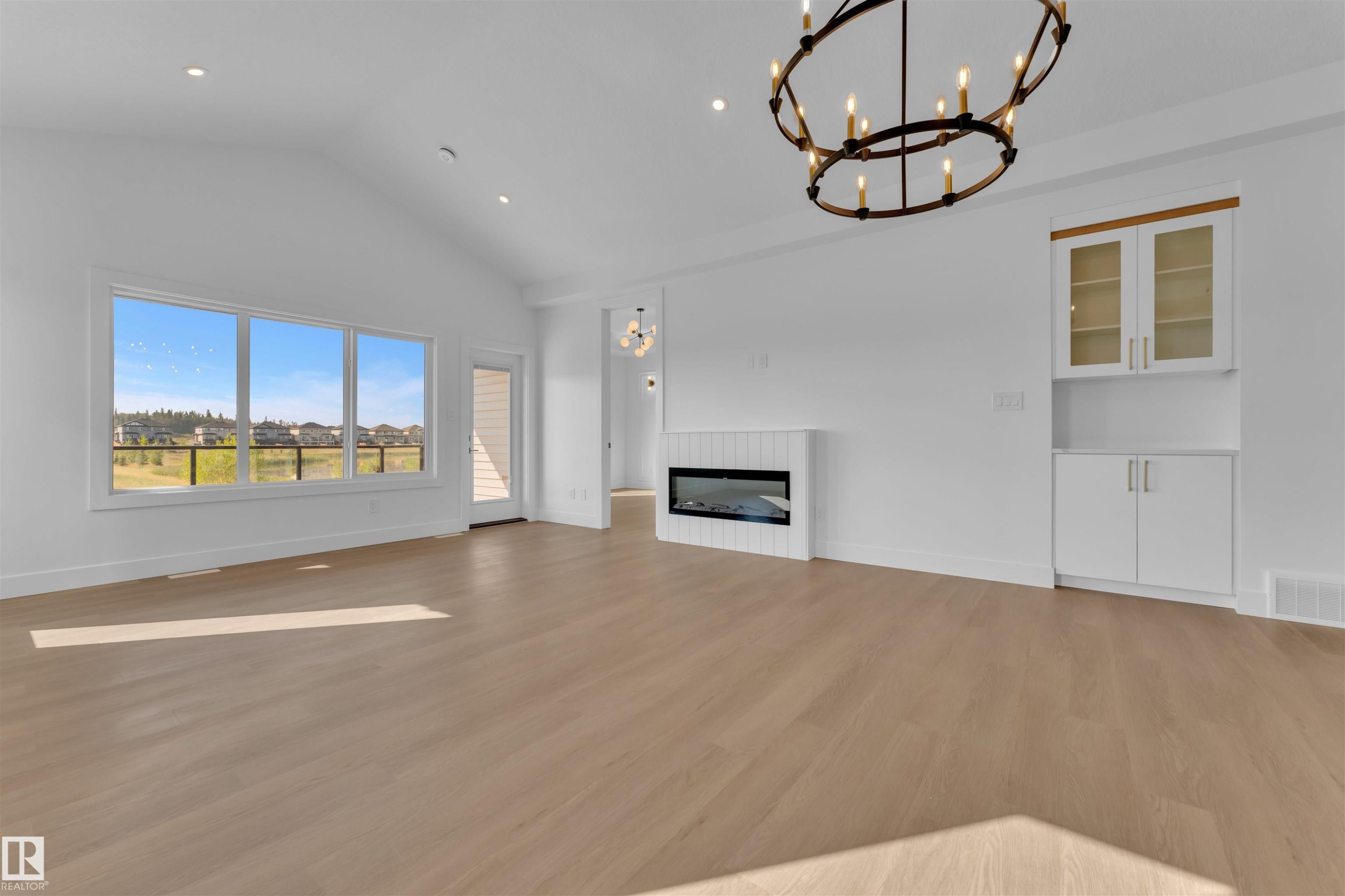 164 Caledon Crescent, Spruce Grove, AB - Indoor Photo Showing Other Room With Fireplace
