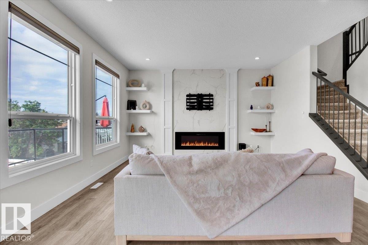 9327 181 Avenue, Edmonton, AB - Indoor Photo Showing Living Room With Fireplace