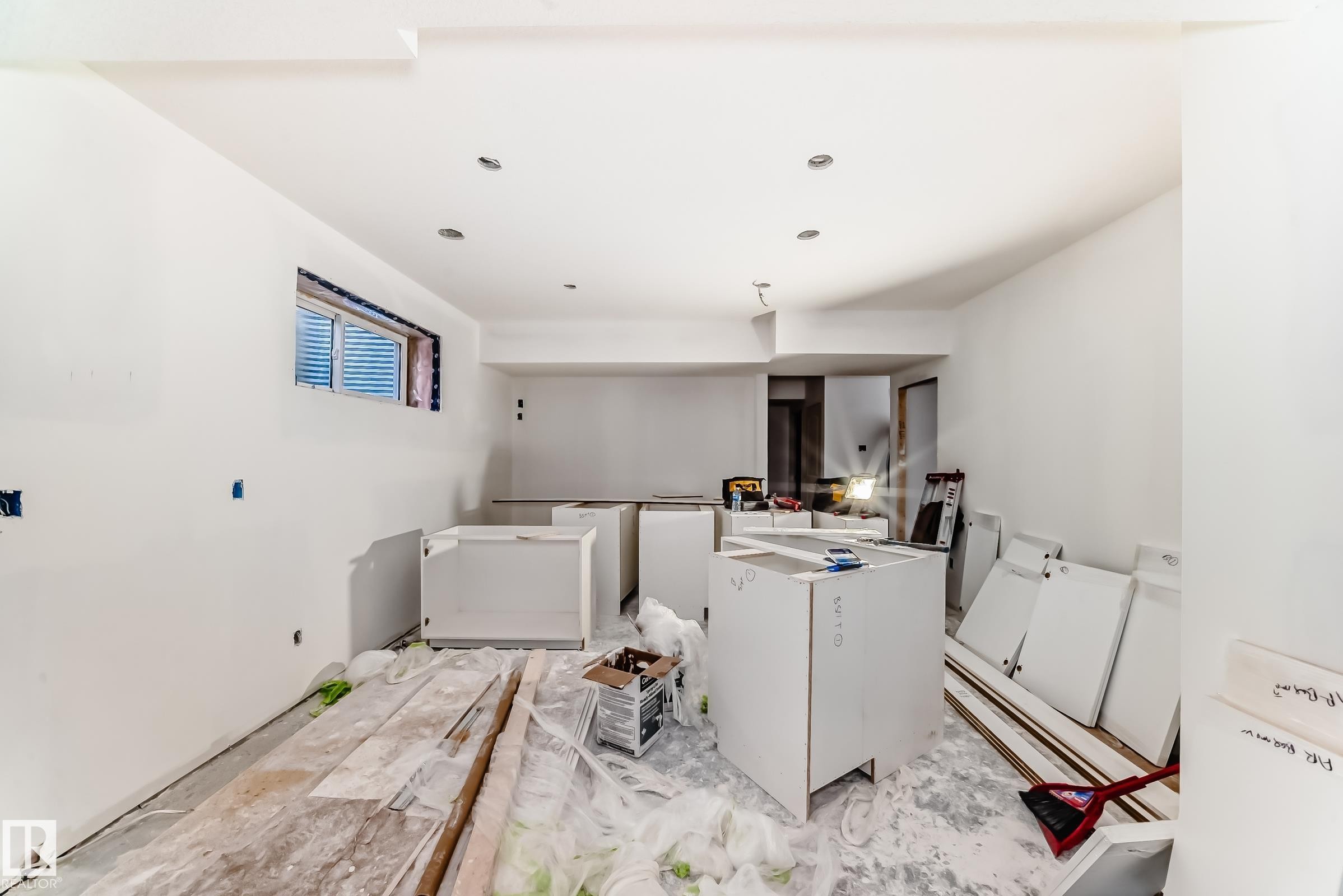 The property presents an interior space with white walls and recessed lighting - 22407 99 Avenue, Edmonton, AB - Indoor Photo Showing Laundry Room