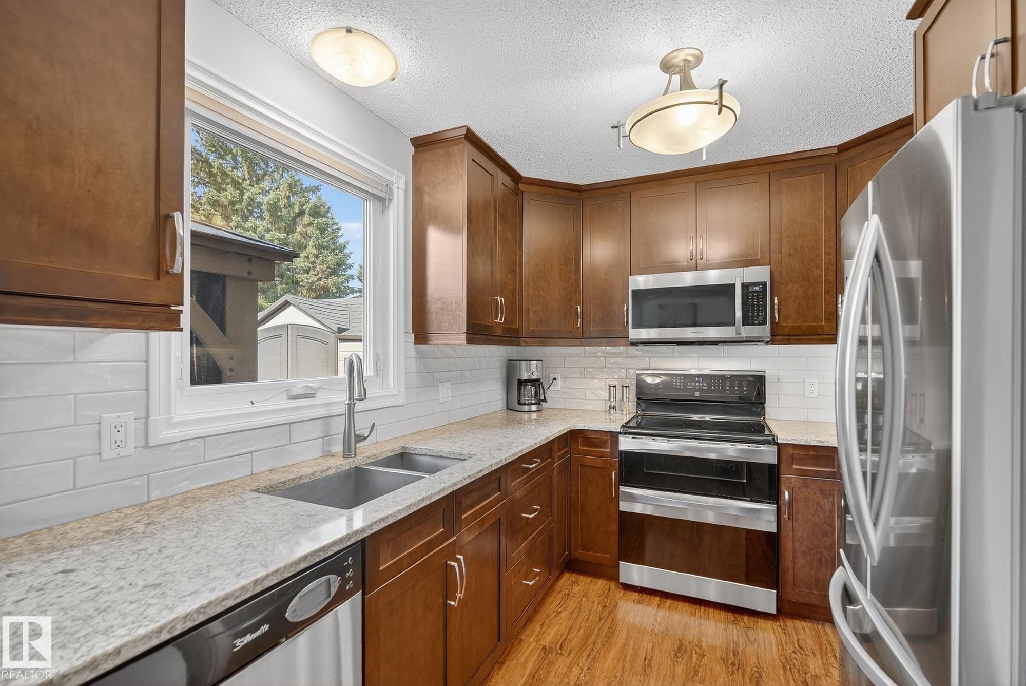 3528 56 Street, Edmonton, AB - Indoor Photo Showing Kitchen With Double Sink