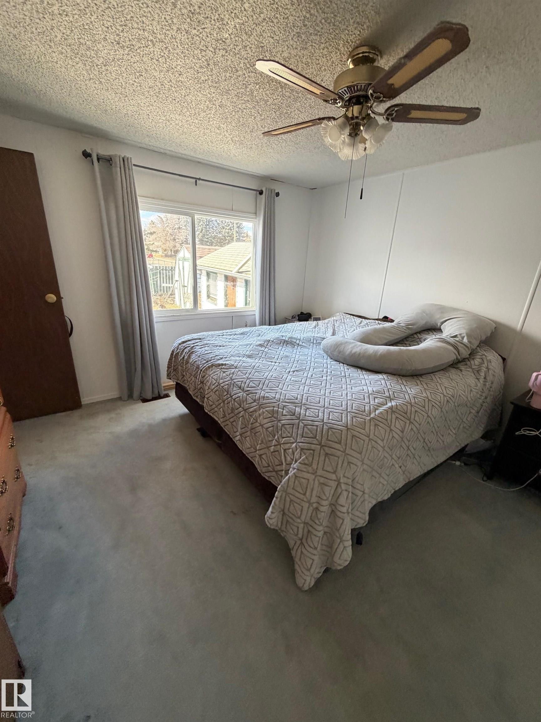 32 4202 45 Street, Wetaskiwin, AB - Indoor Photo Showing Bedroom