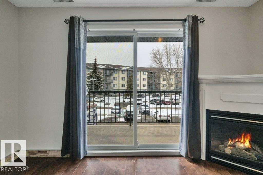 242 16311 95 Street, Edmonton, AB - Indoor With Fireplace