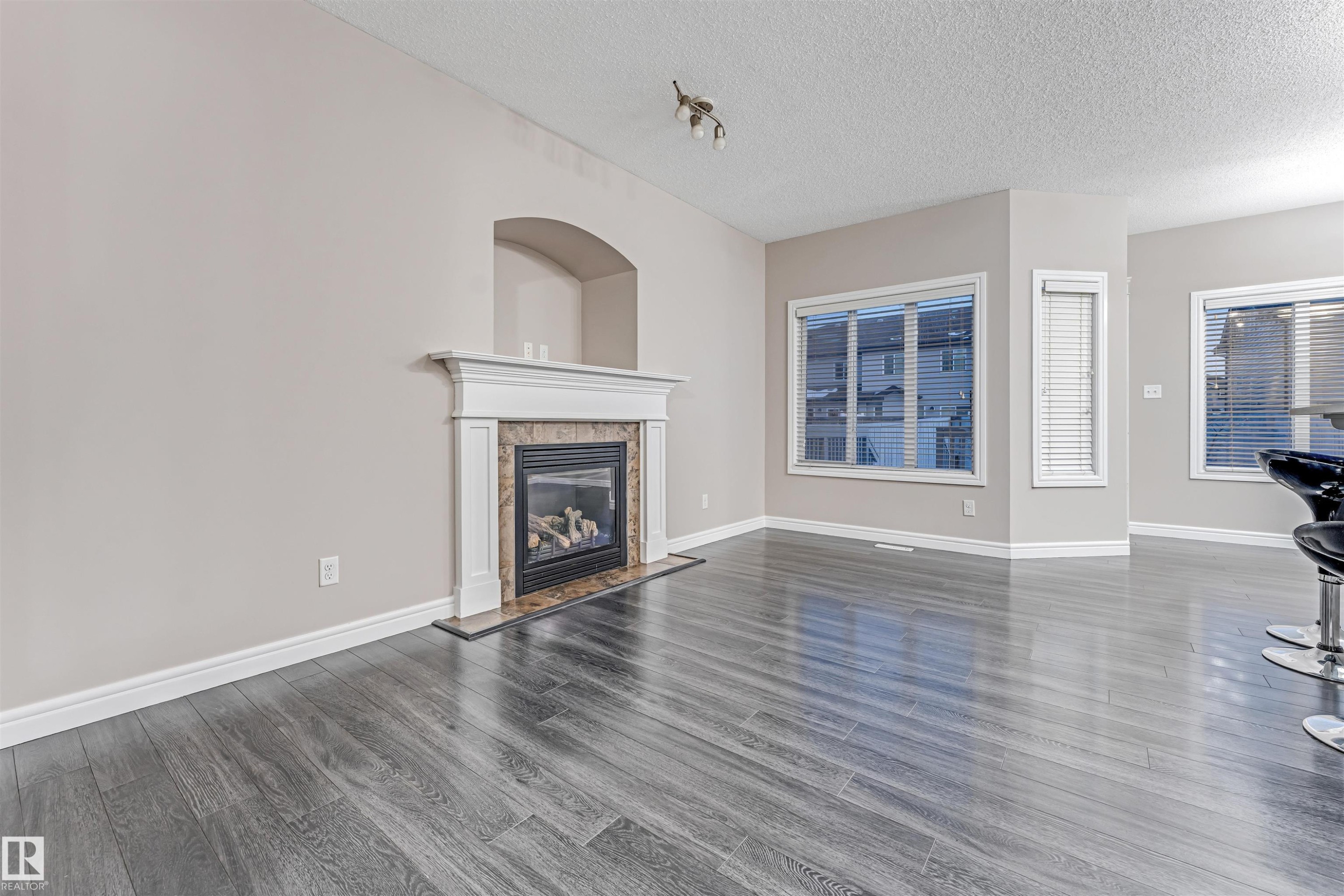 2929 16A Avenue, Edmonton, AB - Indoor Photo Showing Living Room With Fireplace