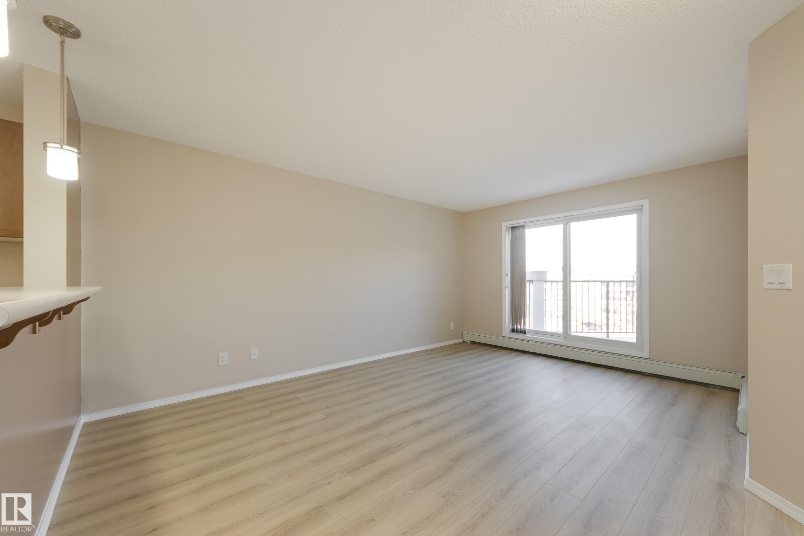 404 6070 Schonsee Way, Edmonton, AB - Indoor Photo Showing Other Room