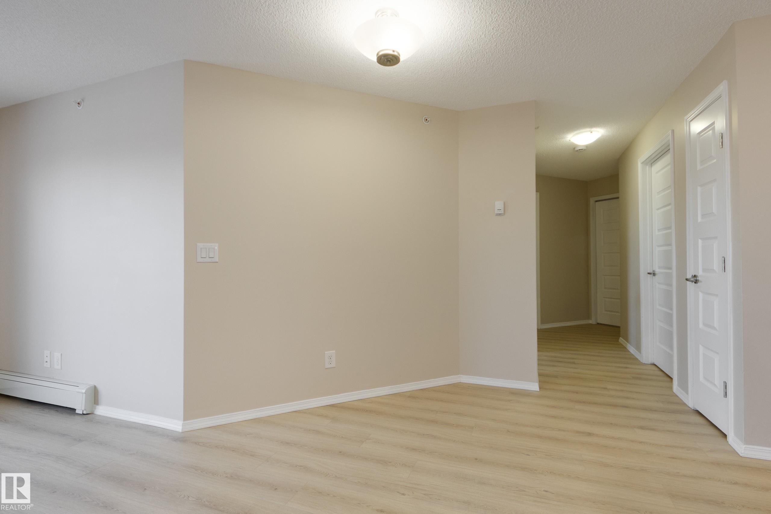 404 6070 Schonsee Way, Edmonton, AB - Indoor Photo Showing Other Room