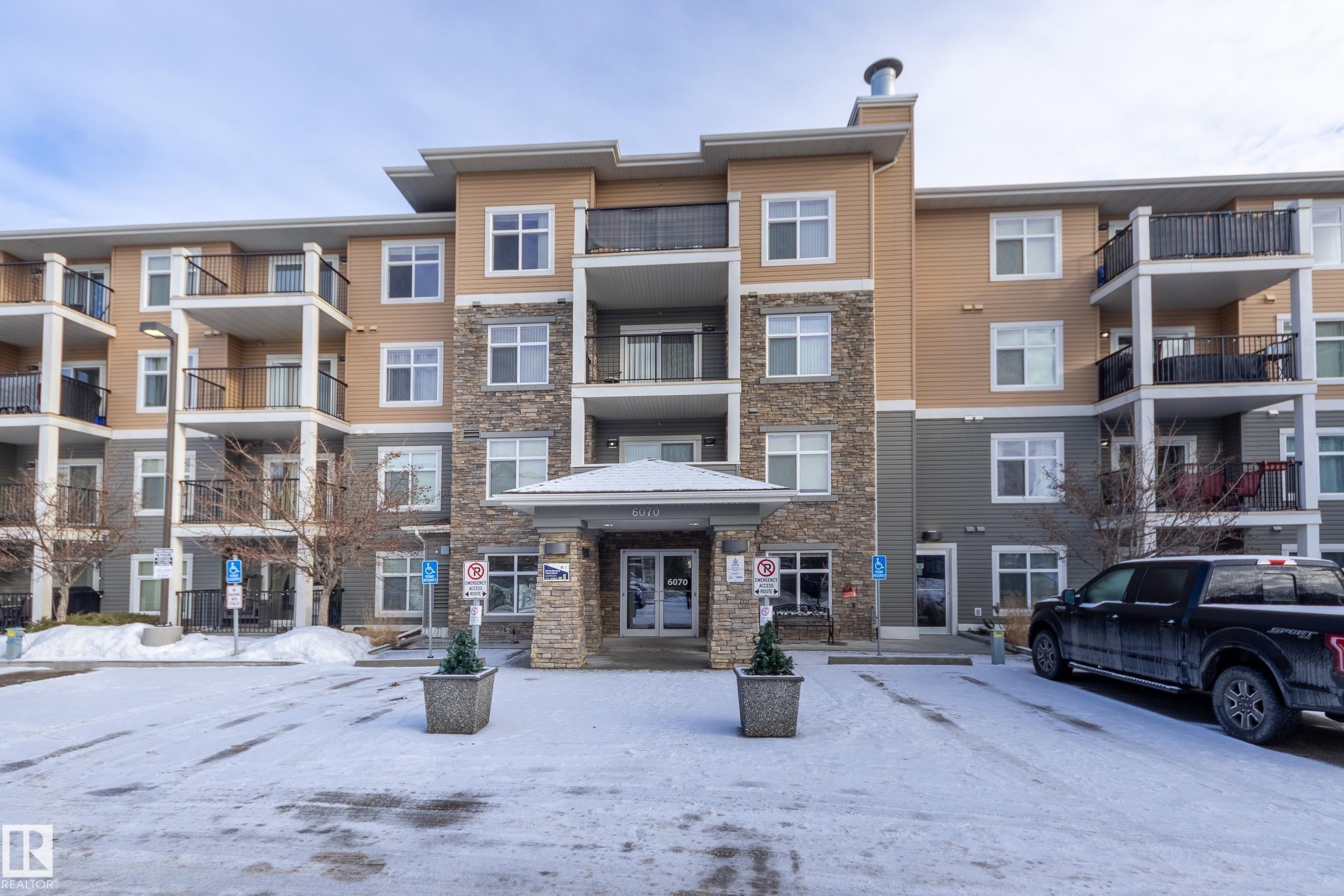 404 6070 Schonsee Way, Edmonton, AB - Outdoor With Balcony With Facade