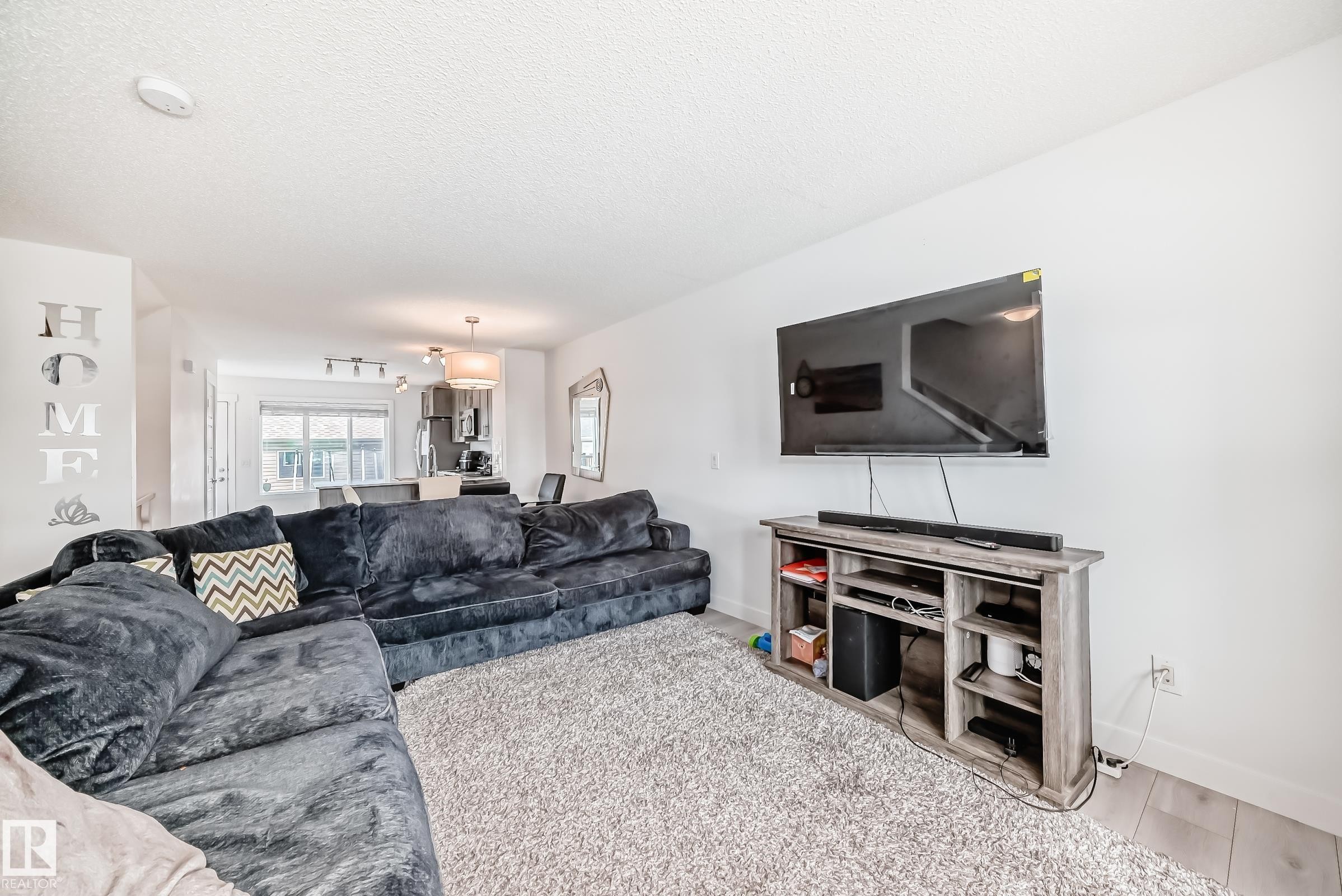 374 Crystallina Nera Drive Nw, Edmonton, AB - Indoor Photo Showing Living Room