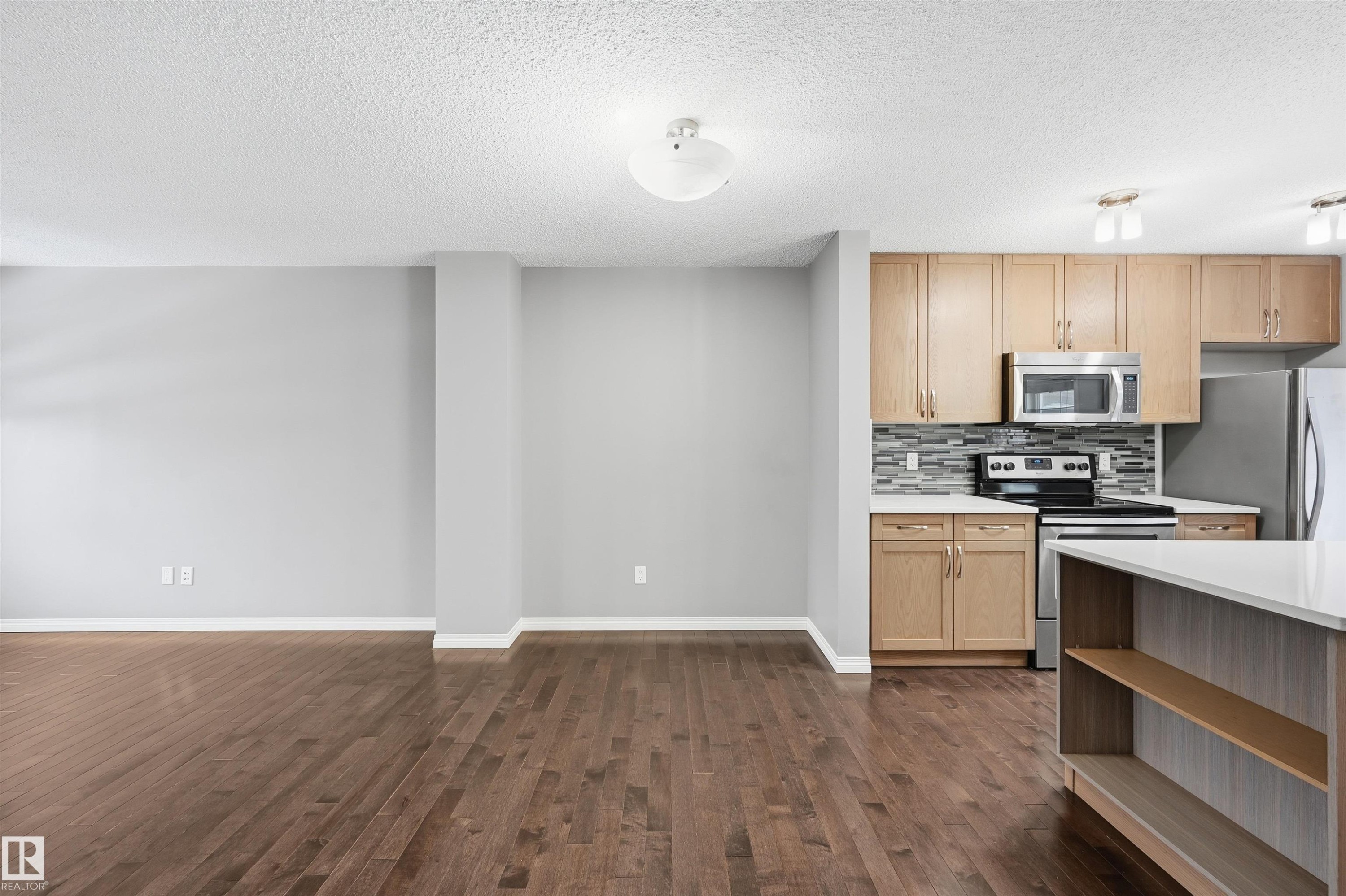 4033 Orchards Drive, Edmonton, AB - Indoor Photo Showing Kitchen With Stainless Steel Kitchen