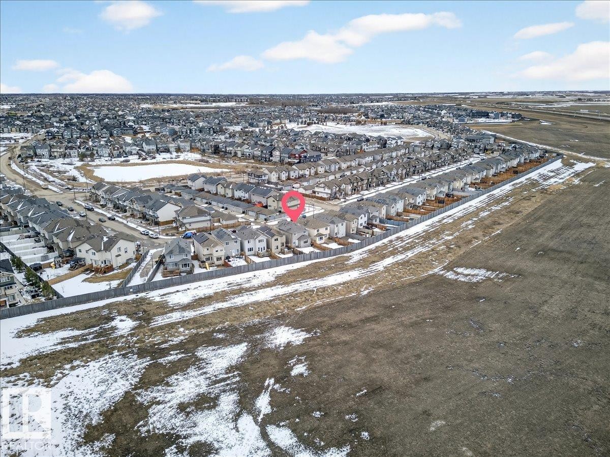 Aerial view of the property and its surrounding neighbourhood - 17023 38 Street Nw, Edmonton, AB - Outdoor With View