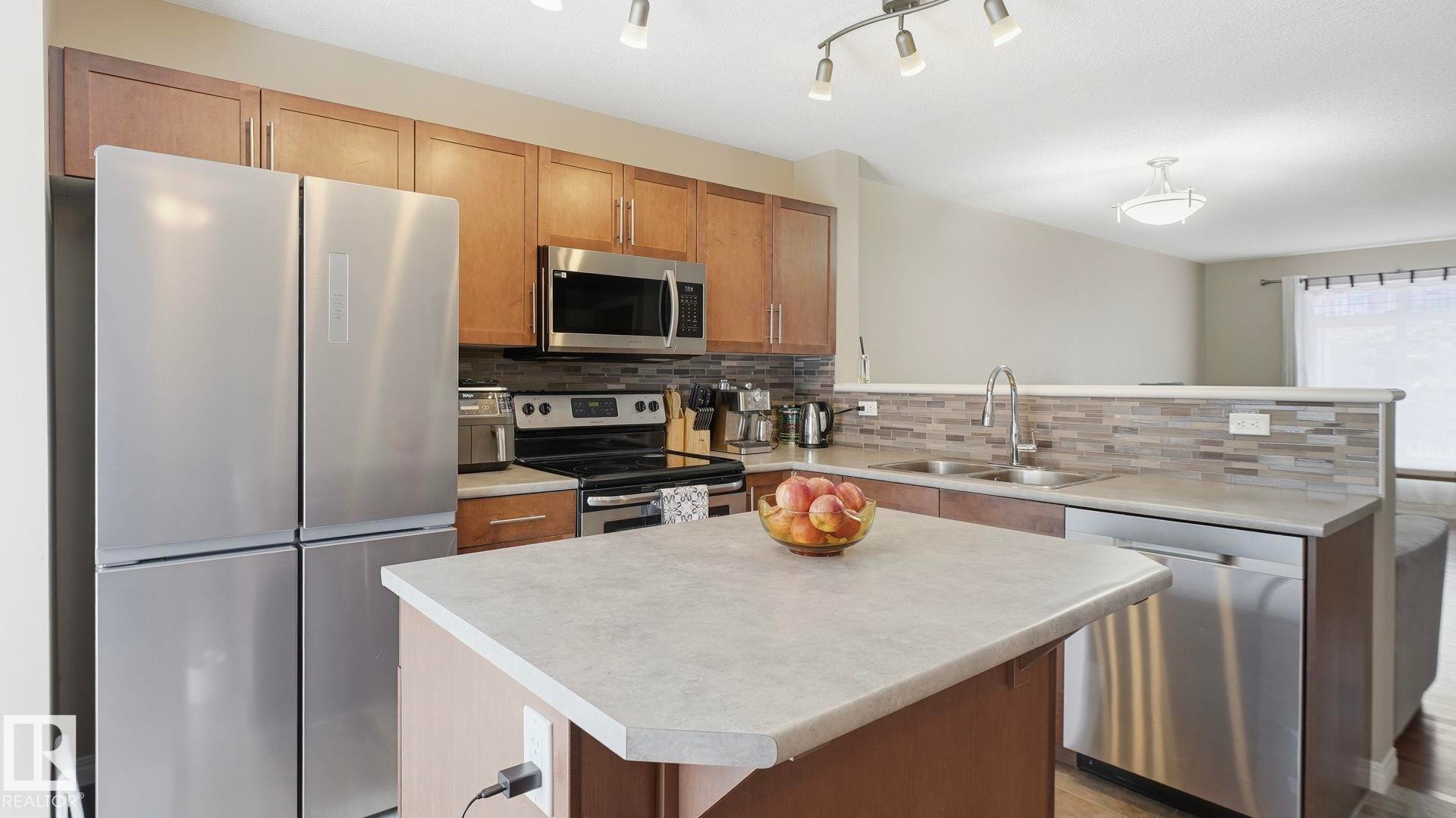 169 1804 70 St, Edmonton, AB - Indoor Photo Showing Kitchen With Double Sink