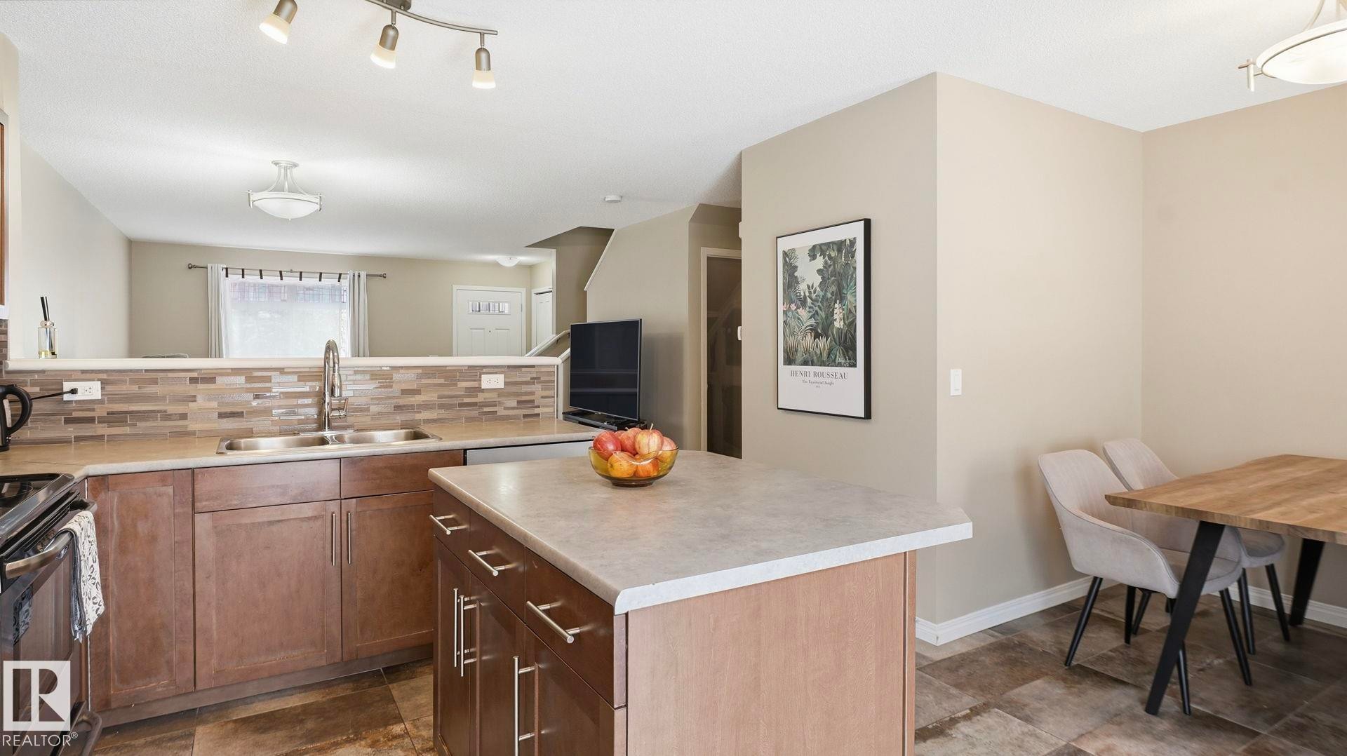 169 1804 70 St, Edmonton, AB - Indoor Photo Showing Kitchen With Double Sink