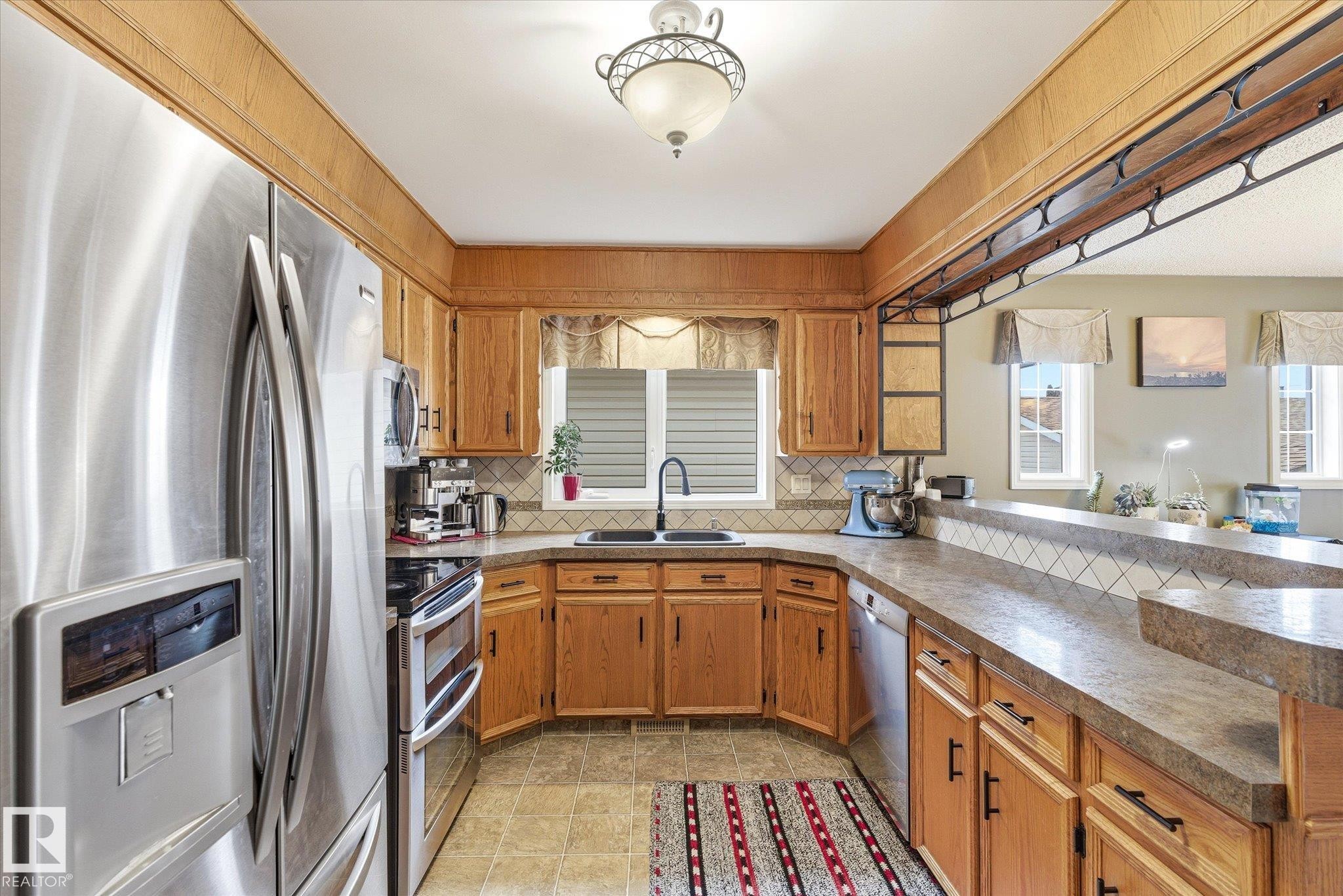 8427 152B Avenue, Edmonton, AB - Indoor Photo Showing Kitchen With Double Sink