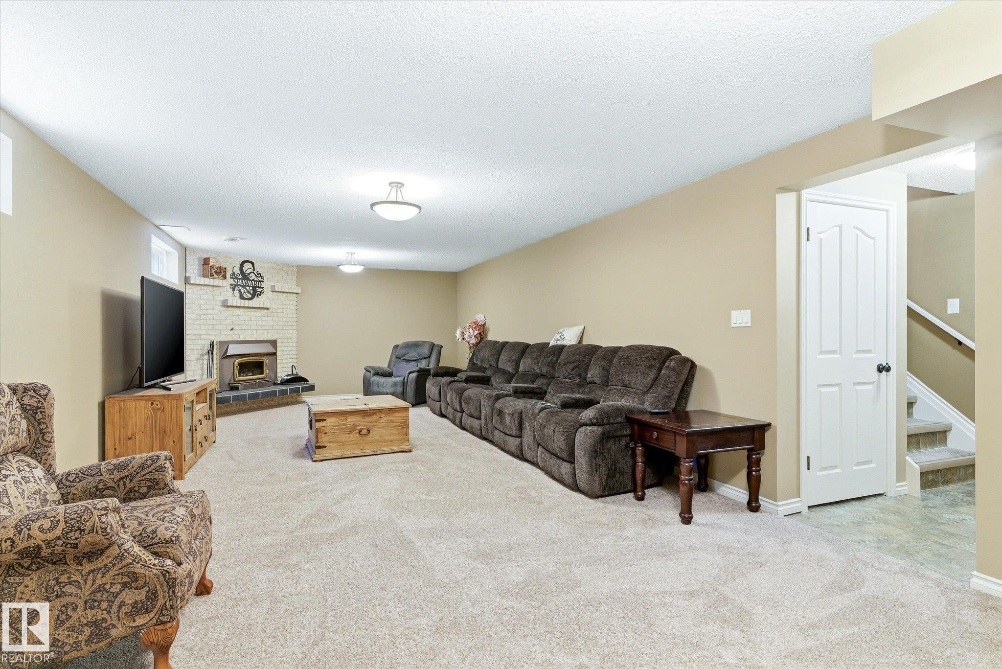 8427 152B Avenue, Edmonton, AB - Indoor Photo Showing Other Room With Fireplace