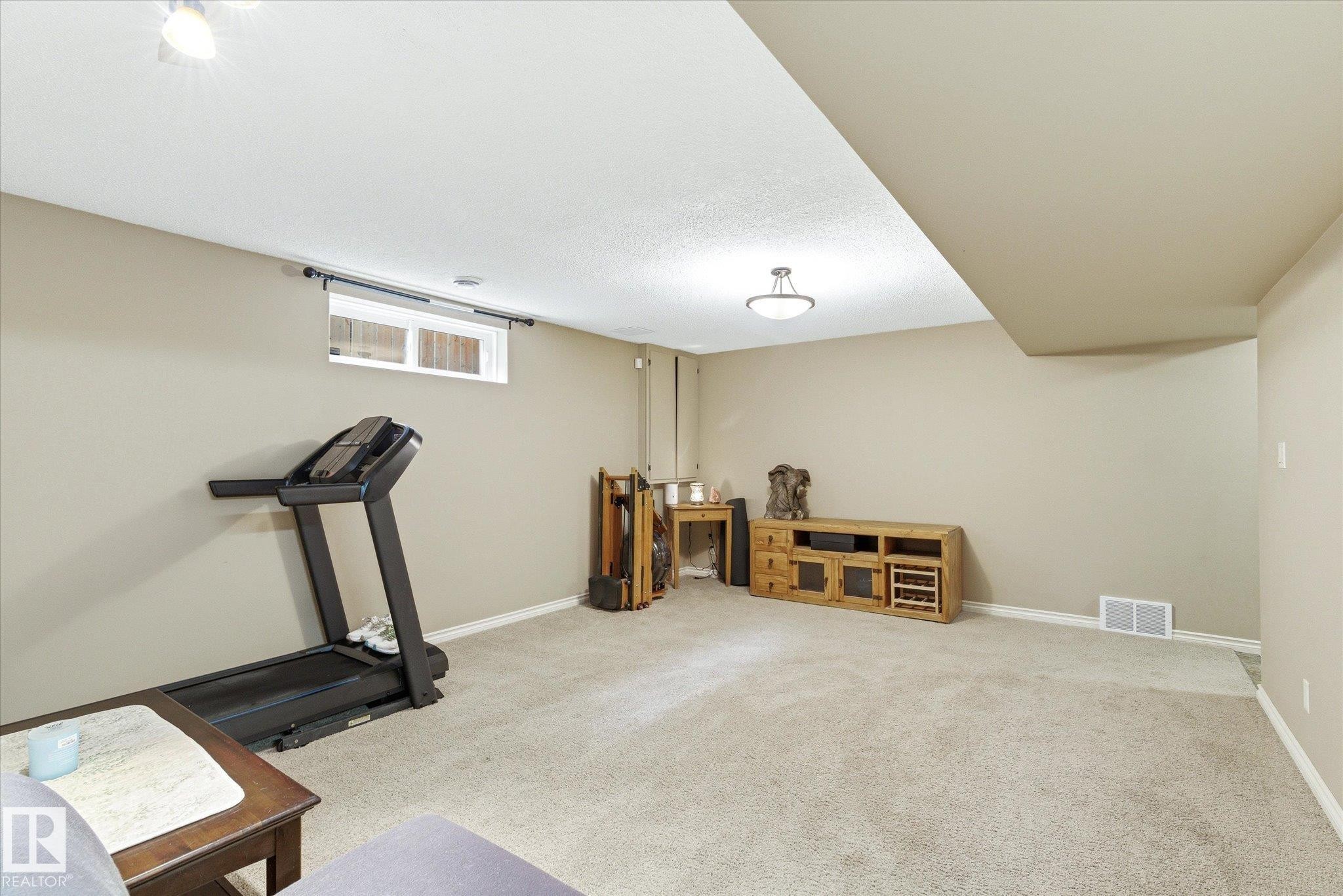 8427 152B Avenue, Edmonton, AB - Indoor Photo Showing Gym Room