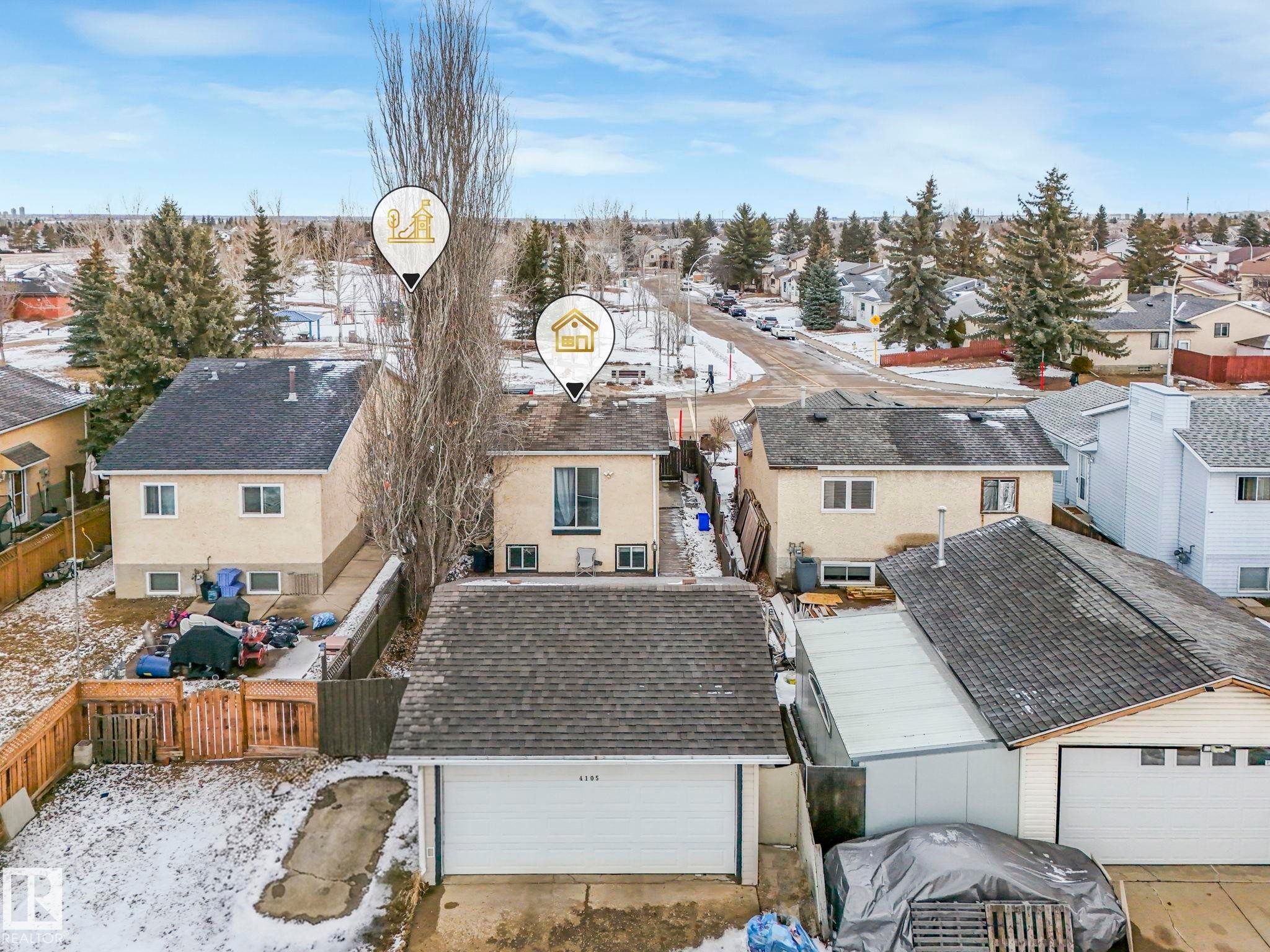 This property features a detached garage with an automatic door - 4105 41 Avenue, Edmonton, AB - Outdoor