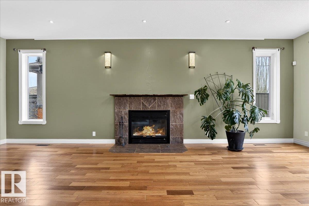 1004 Downey Way, Edmonton, AB - Indoor Photo Showing Living Room With Fireplace