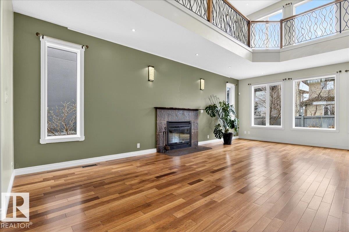 1004 Downey Way, Edmonton, AB - Indoor Photo Showing Living Room With Fireplace