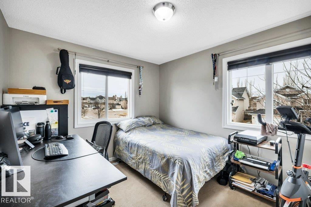 1 Rosemount, Beaumont, AB - Indoor Photo Showing Bedroom