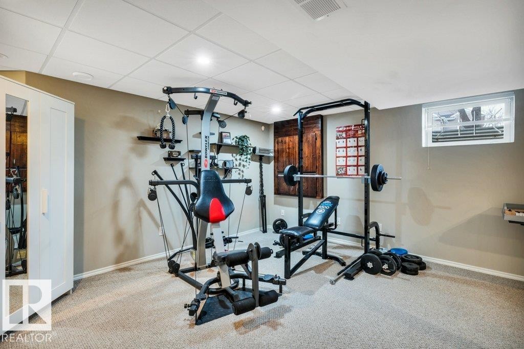 1 Rosemount, Beaumont, AB - Indoor Photo Showing Gym Room