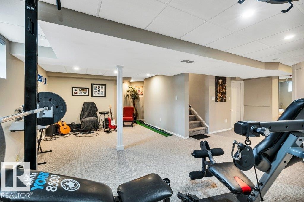 1 Rosemount, Beaumont, AB - Indoor Photo Showing Gym Room