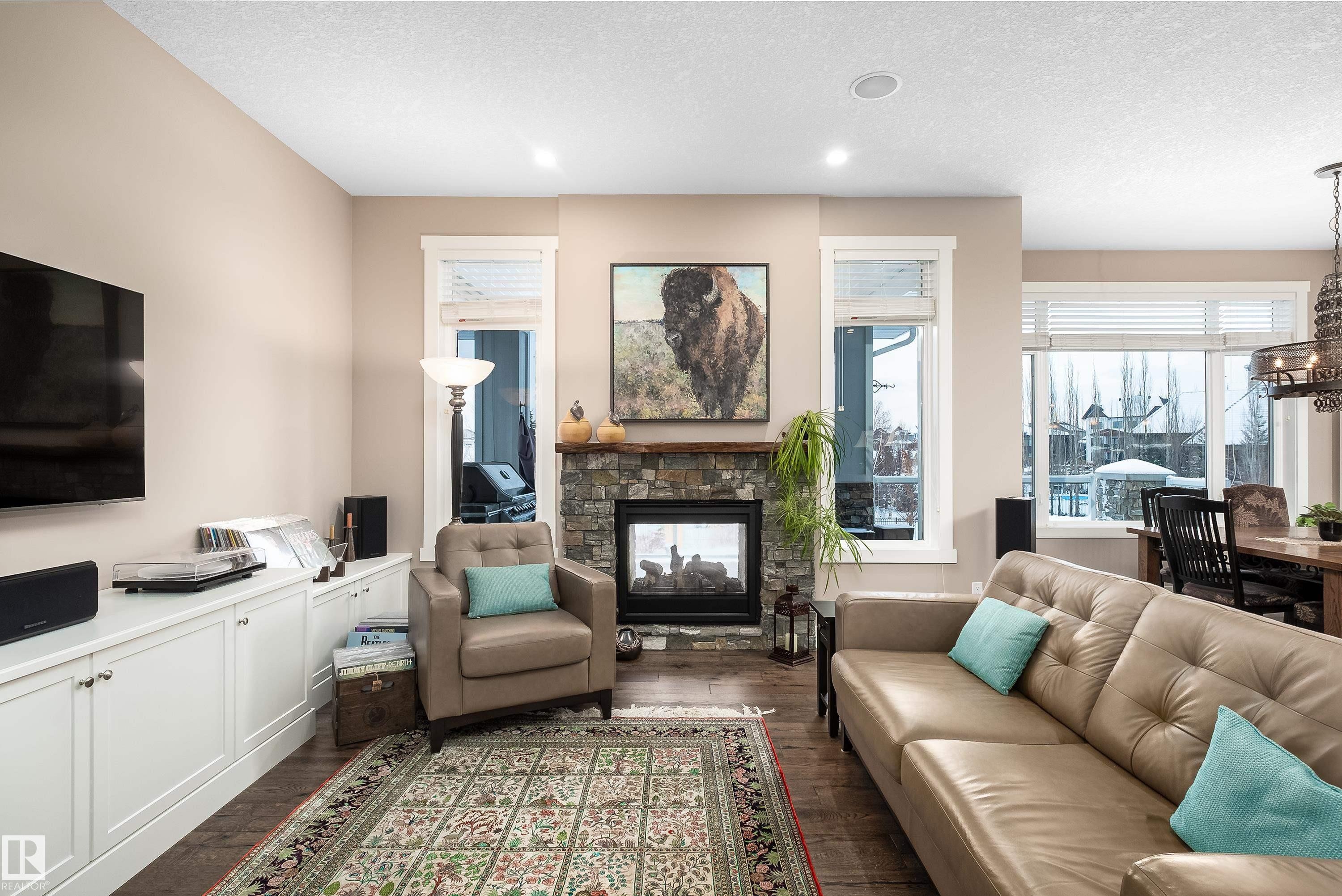1079 Genesis Lake Boulevard, Stony Plain, AB - Indoor Photo Showing Living Room With Fireplace