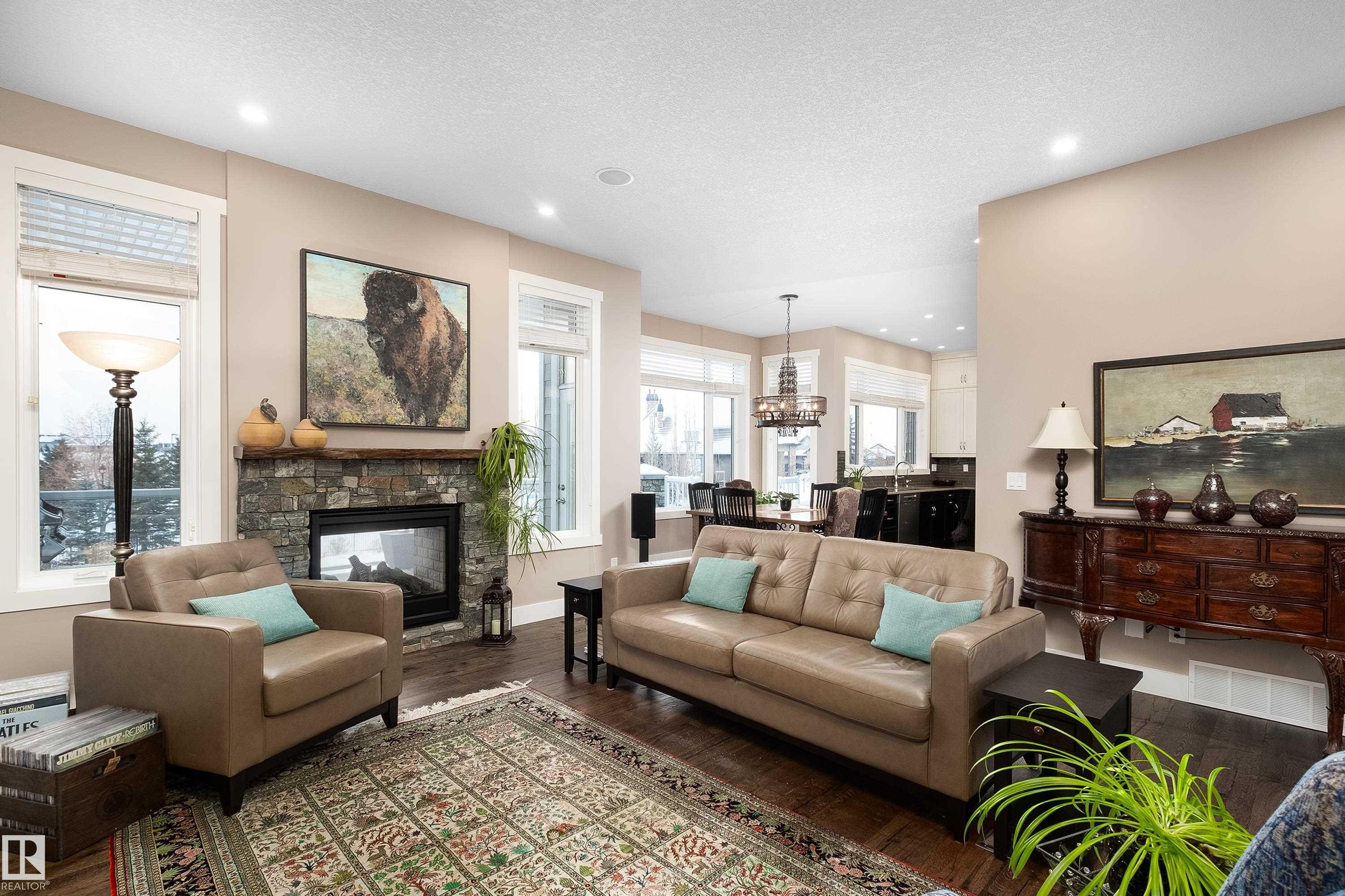 1079 Genesis Lake Boulevard, Stony Plain, AB - Indoor Photo Showing Living Room With Fireplace