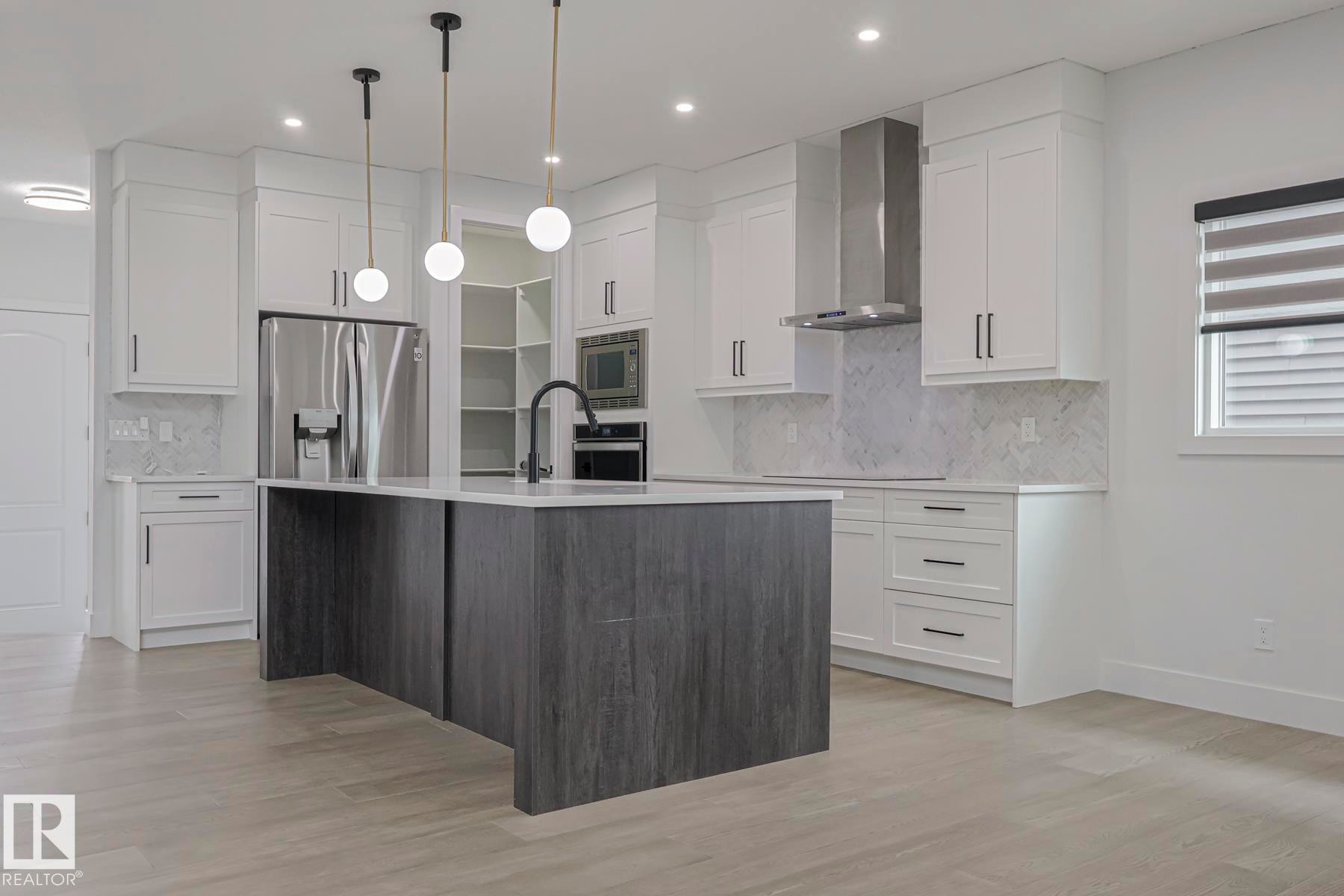 7446 Colonel Mewburn Road, Edmonton, AB - Indoor Photo Showing Kitchen With Upgraded Kitchen