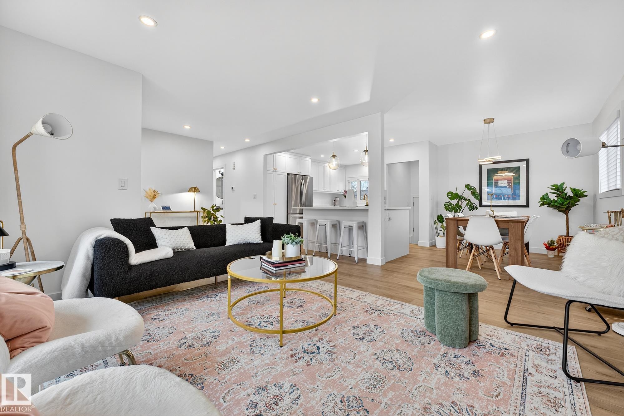 Living room featuring light wood-style flooring and recessed lighting - 8604 142 Street, Edmonton, AB - Indoor Photo Showing Living Room