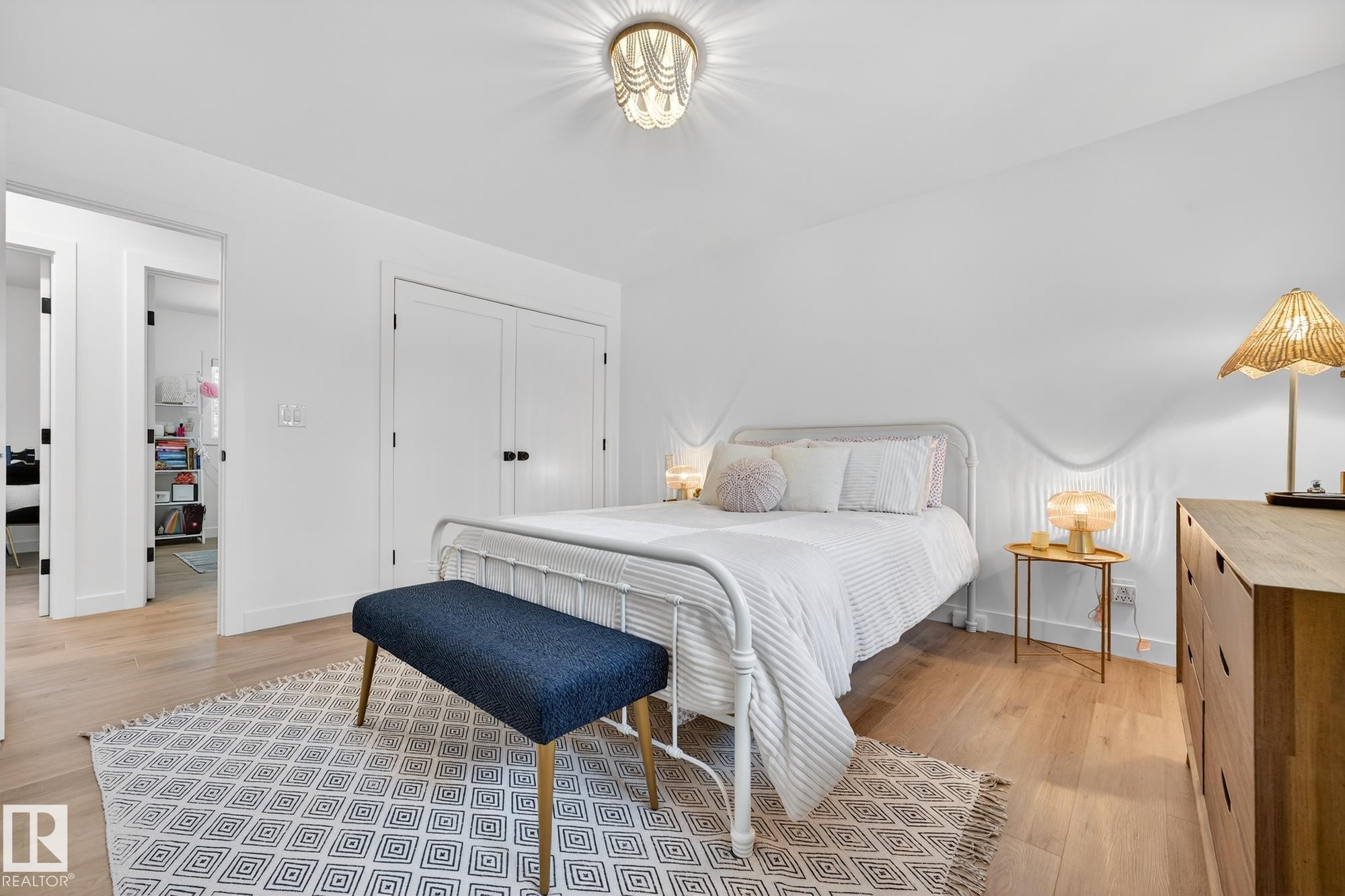 Bedroom featuring light wood-type flooring and a closet - 8604 142 Street, Edmonton, AB - Indoor Photo Showing Bedroom