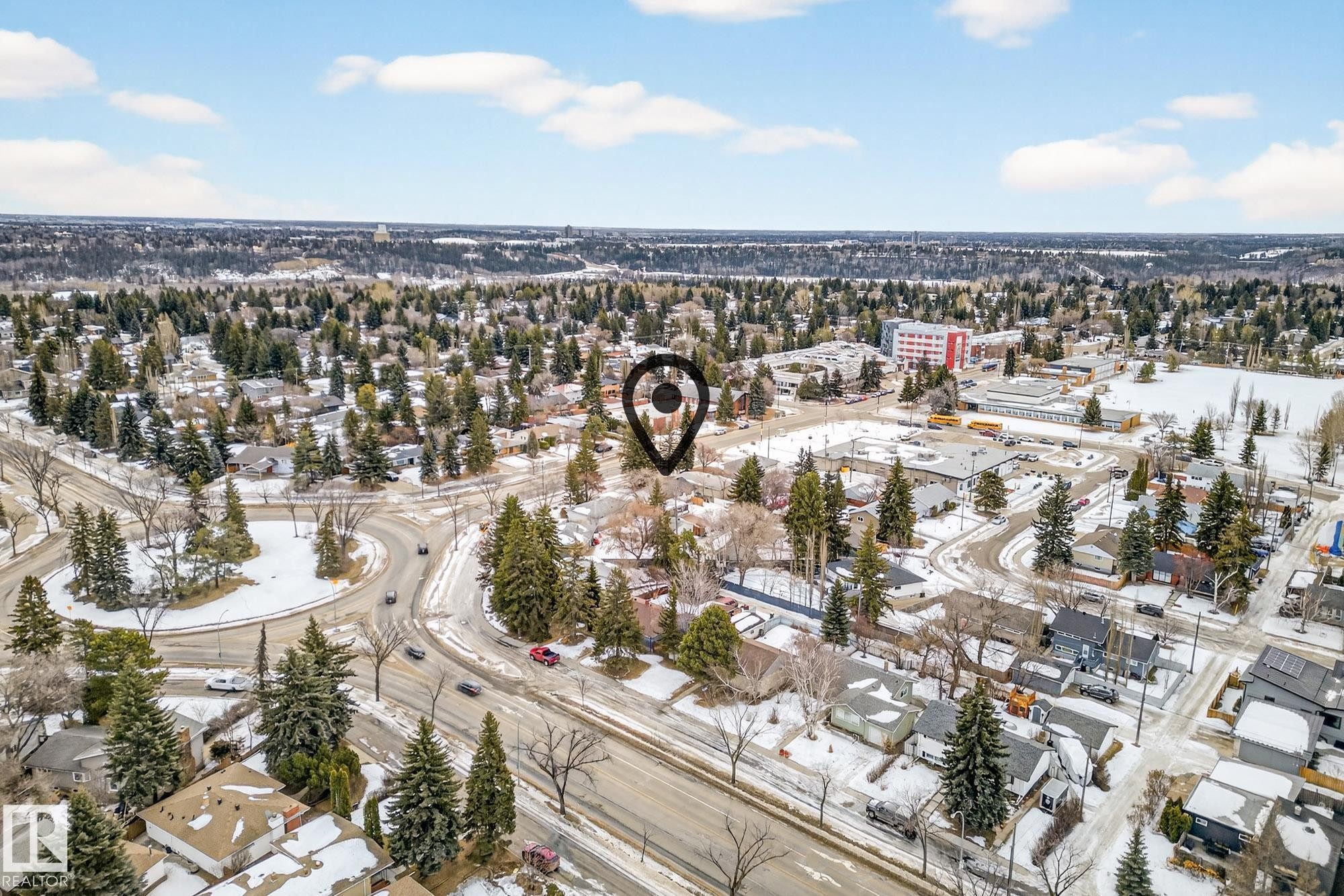 Snowy aerial view featuring a residential view - 8604 142 Street, Edmonton, AB - Outdoor With View
