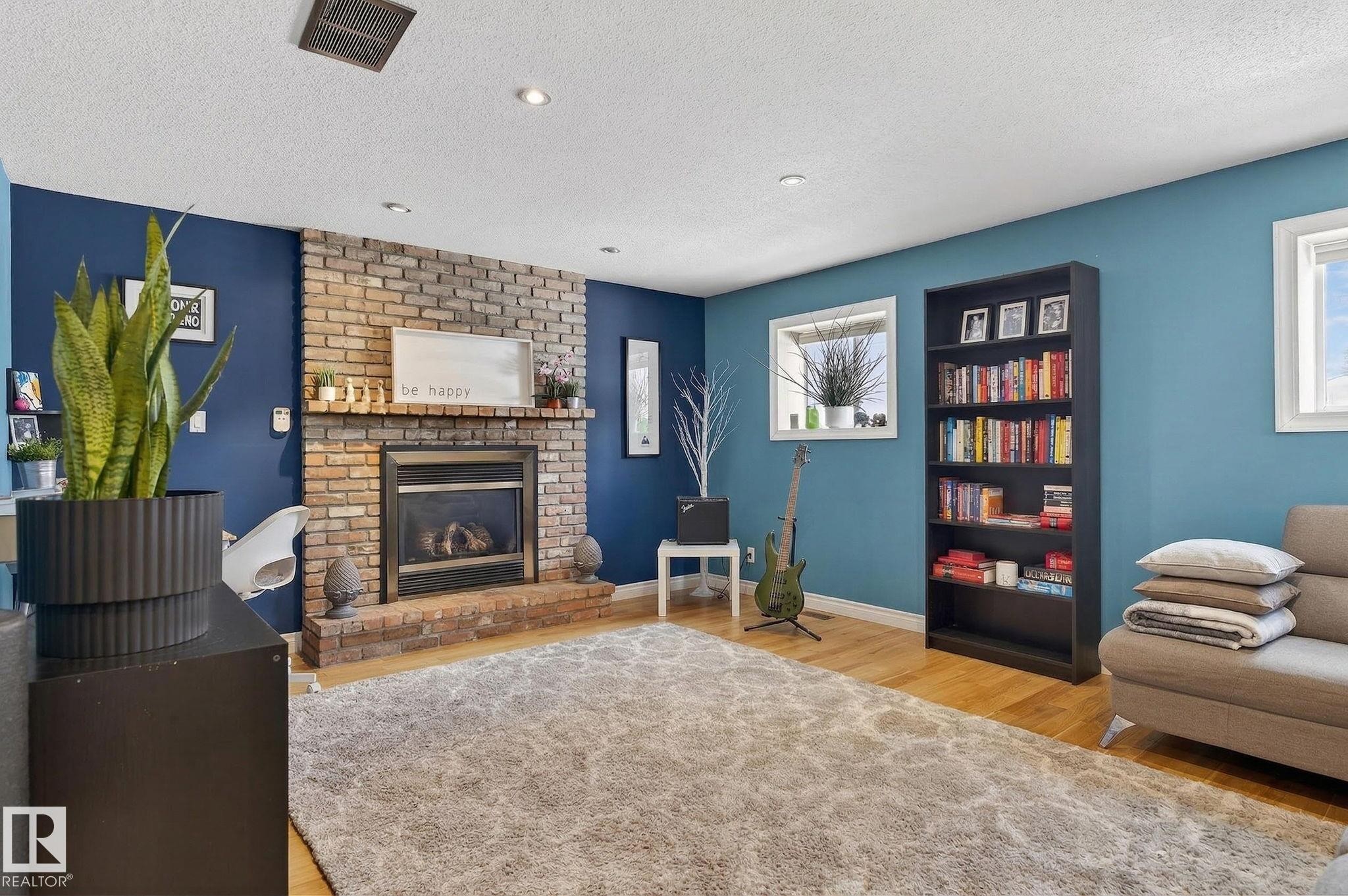 4 Dorset Place, St. Albert, AB - Indoor Photo Showing Living Room With Fireplace