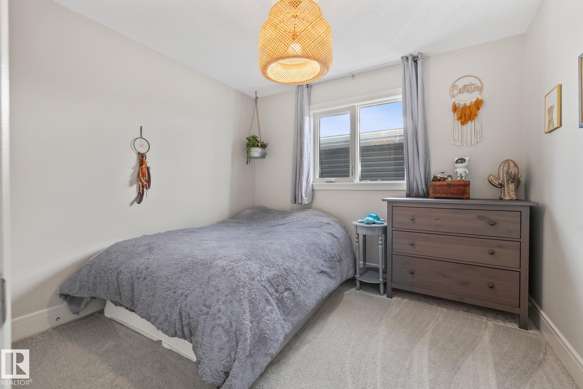 This room features carpeting, a window with blinds and drapes, and a ceiling light fixture - 3864 Robins Crescent, Edmonton, AB - Indoor Photo Showing Bedroom