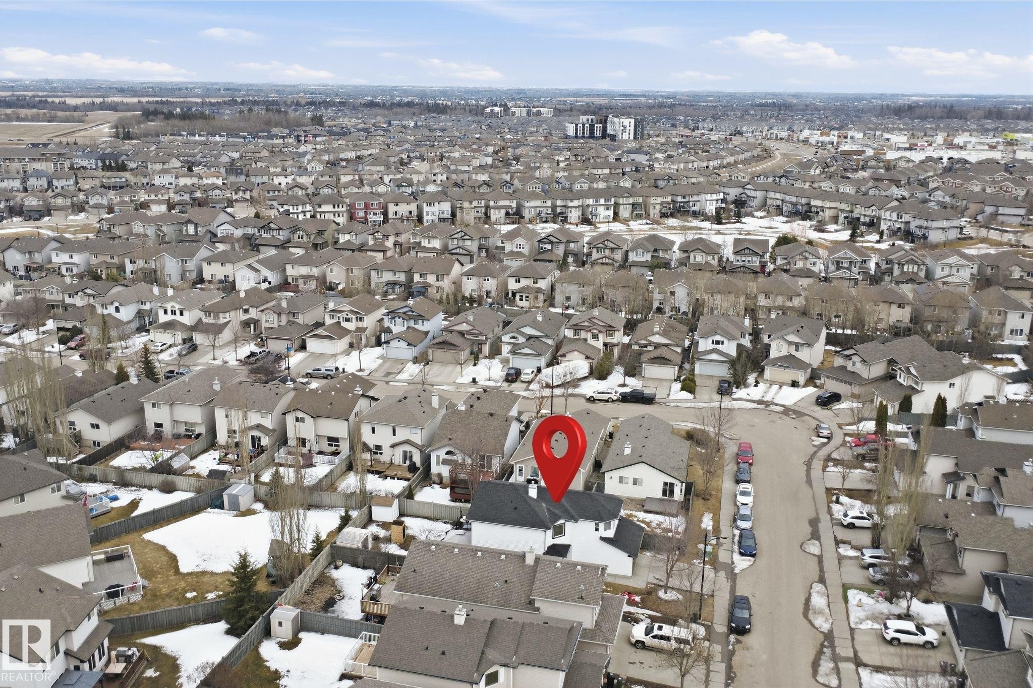 Aerial view showcasing the property within a residential community featuring detached homes - 4619 202 Street, Edmonton, AB - Outdoor With View
