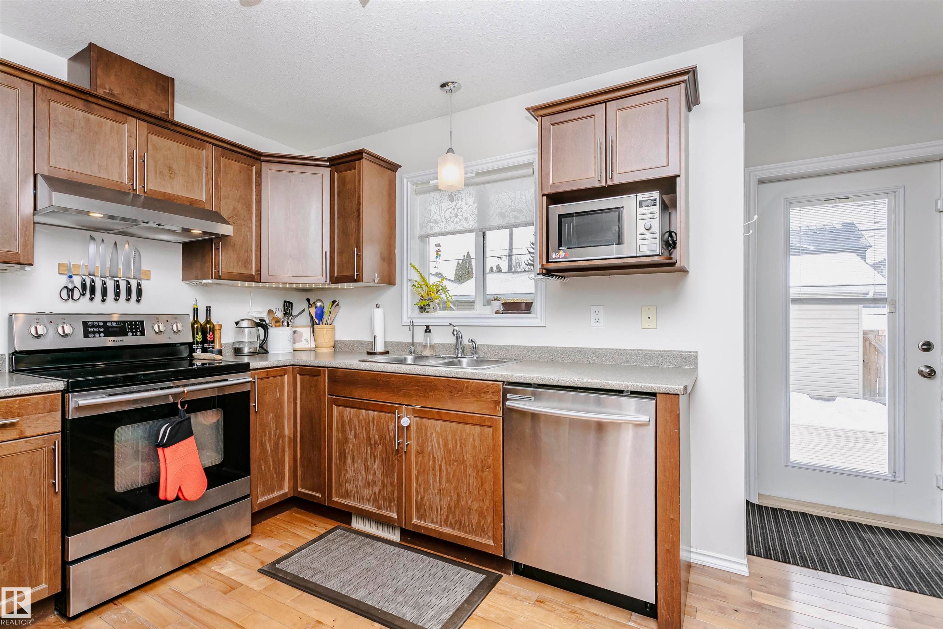 9359 74 Avenue, Edmonton, AB - Indoor Photo Showing Kitchen With Double Sink