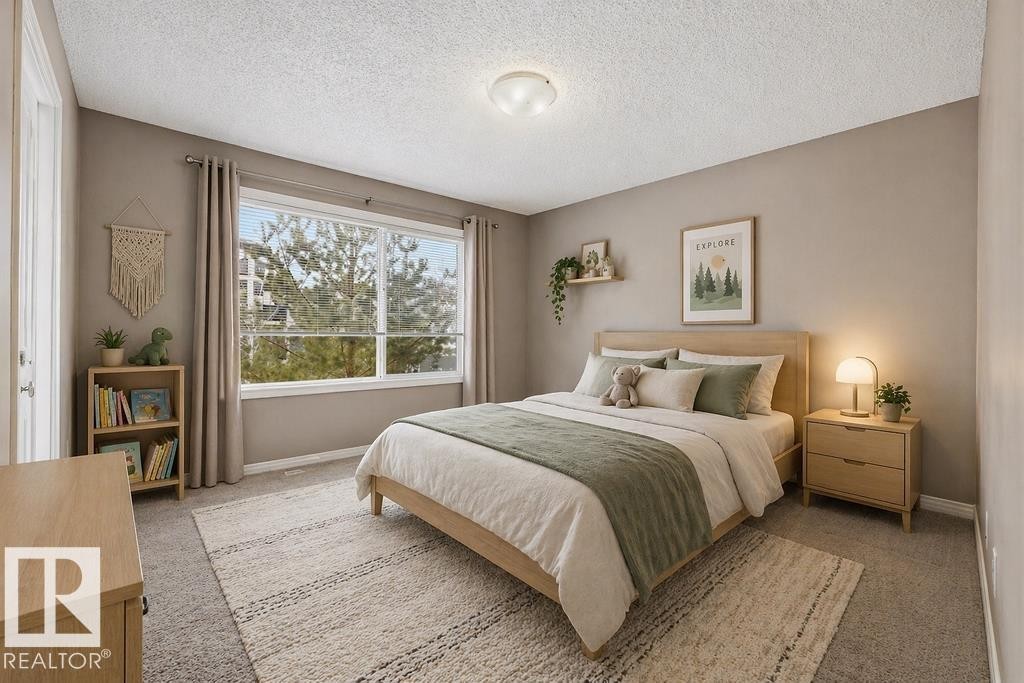 The property features neutral-toned walls, a window with blinds, and carpeting - 7873 170A Avenue, Edmonton, AB - Indoor Photo Showing Other Room
