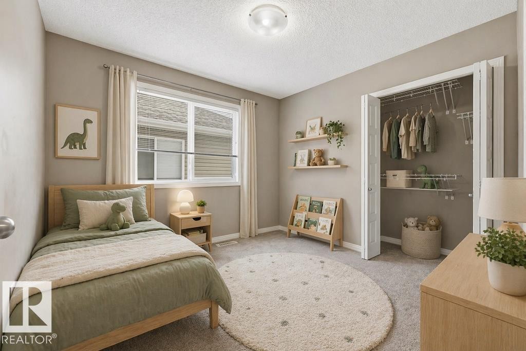 Unfinished basement featuring exposed wooden beams and structural elements, a staircase with gray treads, and ample open space - 7873 170A Avenue, Edmonton, AB - Indoor Photo Showing Basement