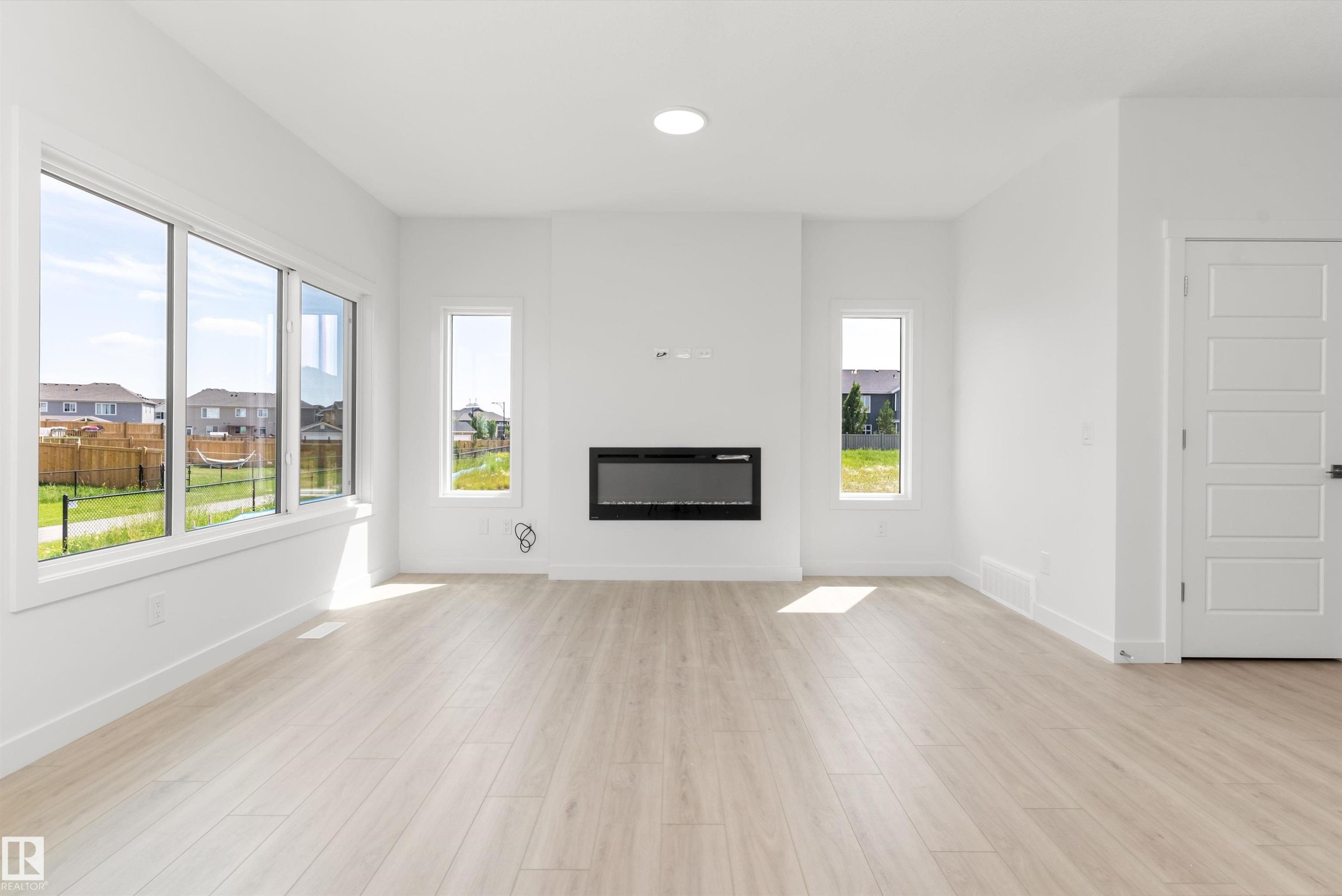 5047 Cawsey Link Sw, Edmonton, AB - Indoor Photo Showing Living Room With Fireplace