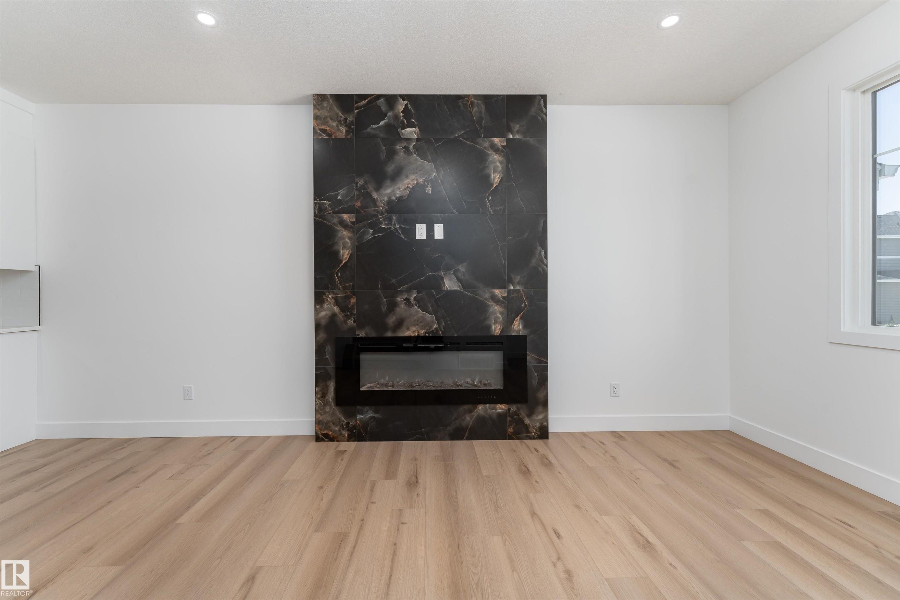 3117 Magpie Way, Edmonton, AB - Indoor Photo Showing Other Room With Fireplace