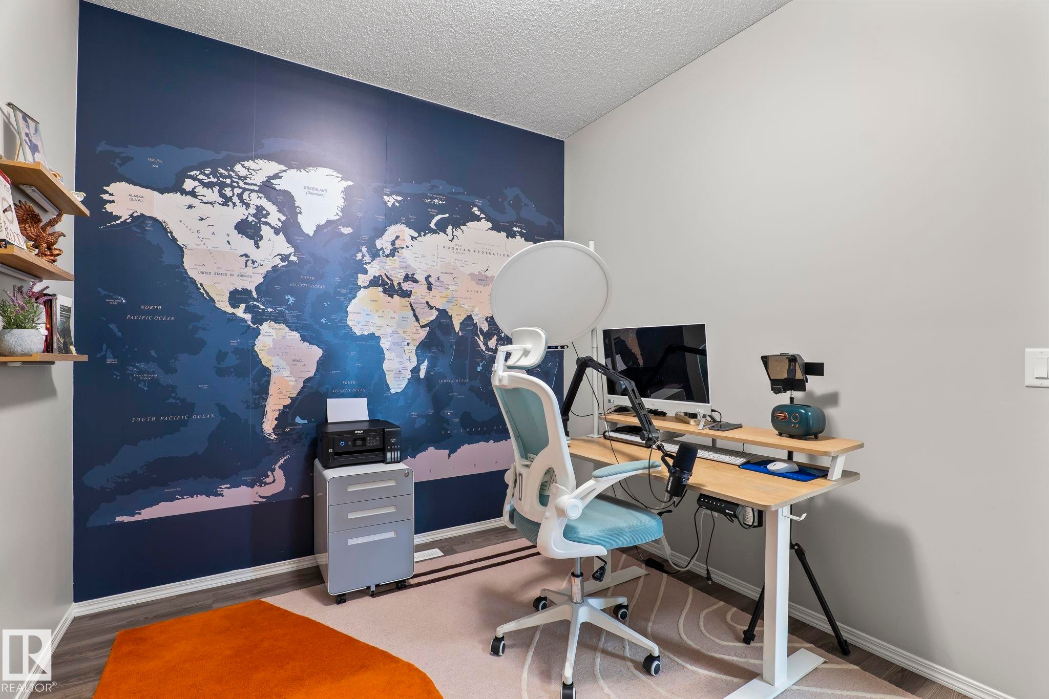 Well-appointed room featuring a large wall map, light-colored walls, and wood-look flooring - 5164 Lark Crescent Nw, Edmonton, AB - Indoor Photo Showing Office