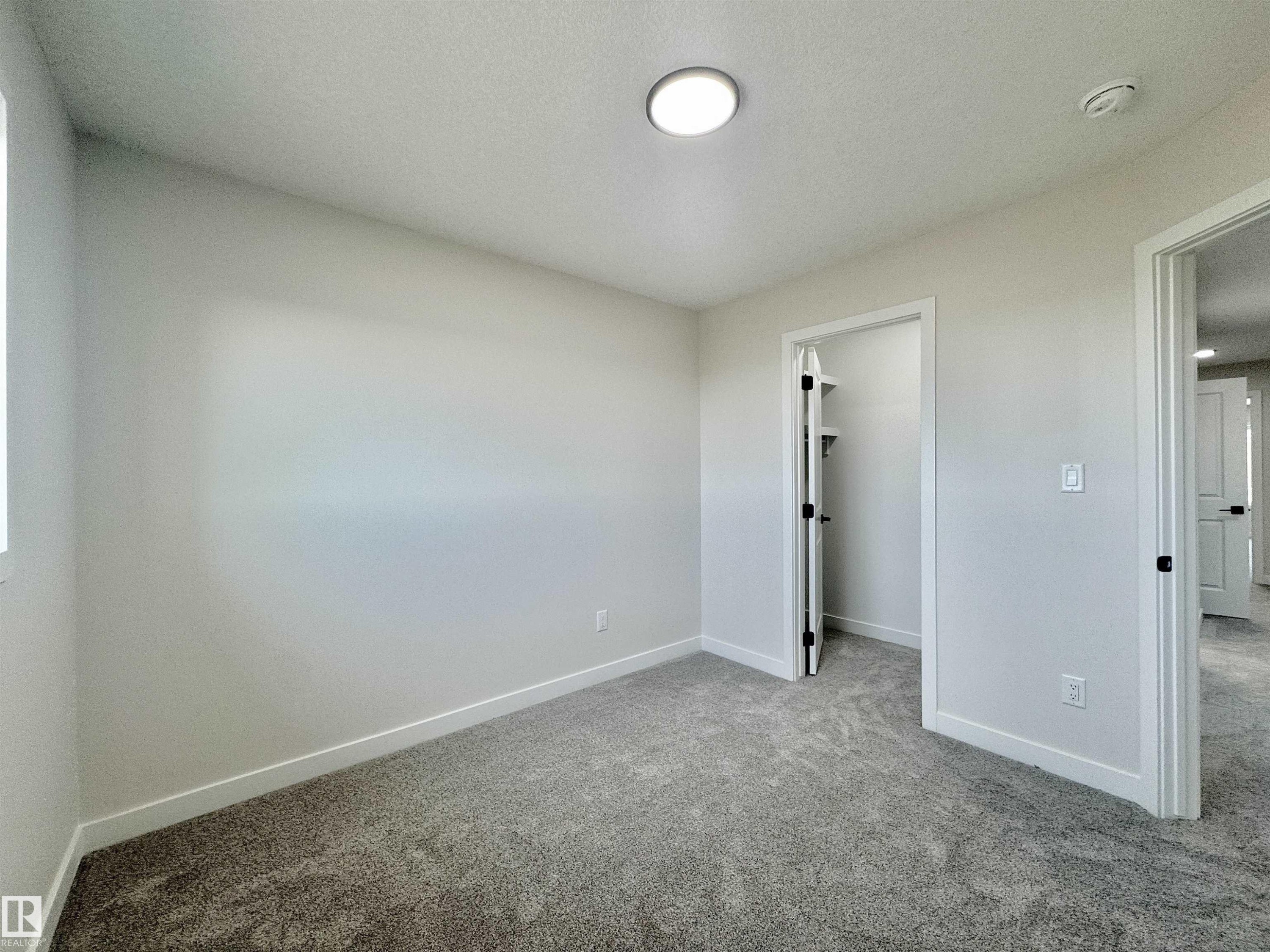 133 Pierwyck Loop, Spruce Grove, AB - Indoor Photo Showing Other Room