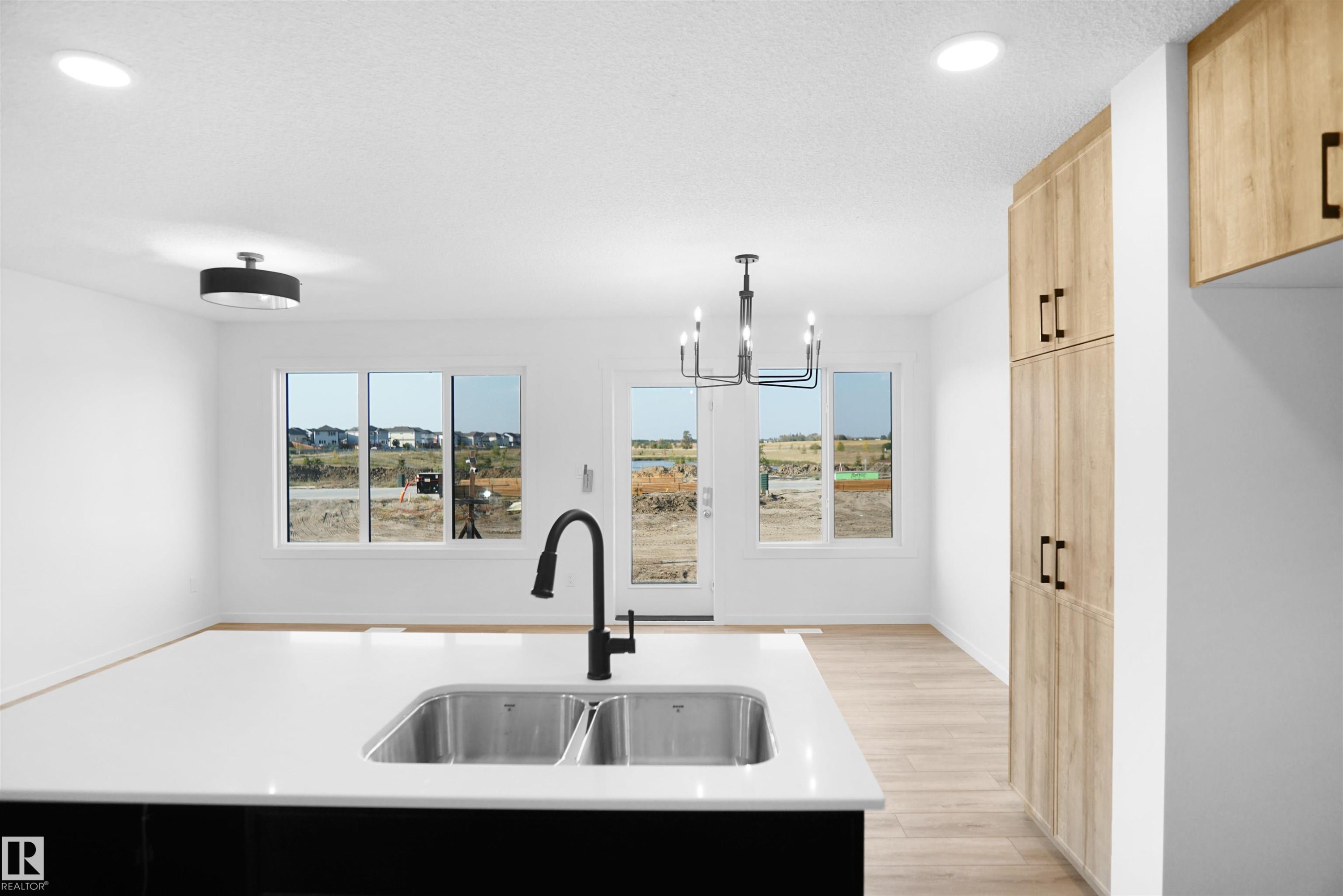 32 1430 Aster Way, Edmonton, AB - Indoor Photo Showing Kitchen With Double Sink