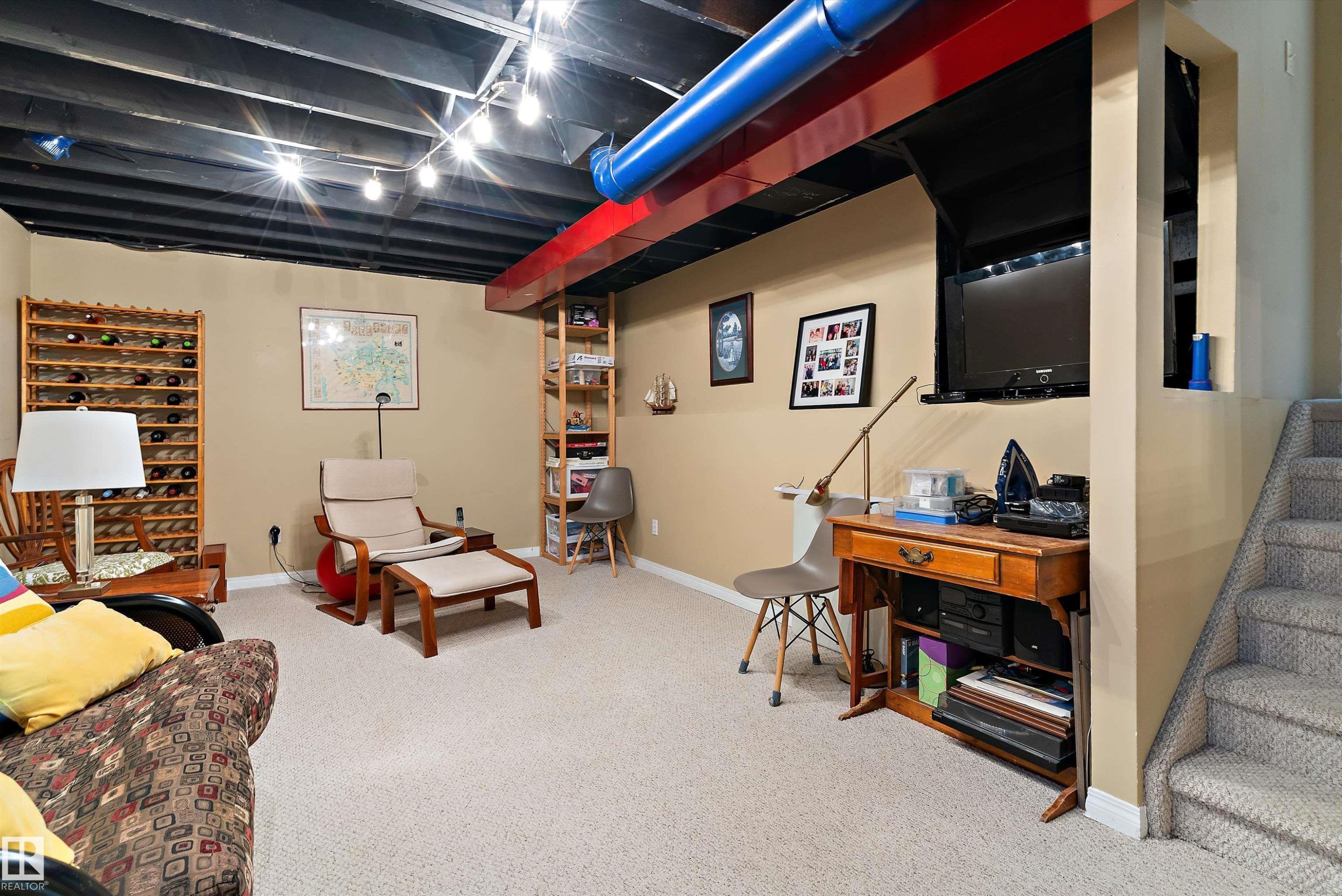 Recreation room featuring carpeted flooring, painted ceiling beams, and recessed lighting - 322 Pearson Crescent, Edmonton, AB - Indoor Photo Showing Basement
