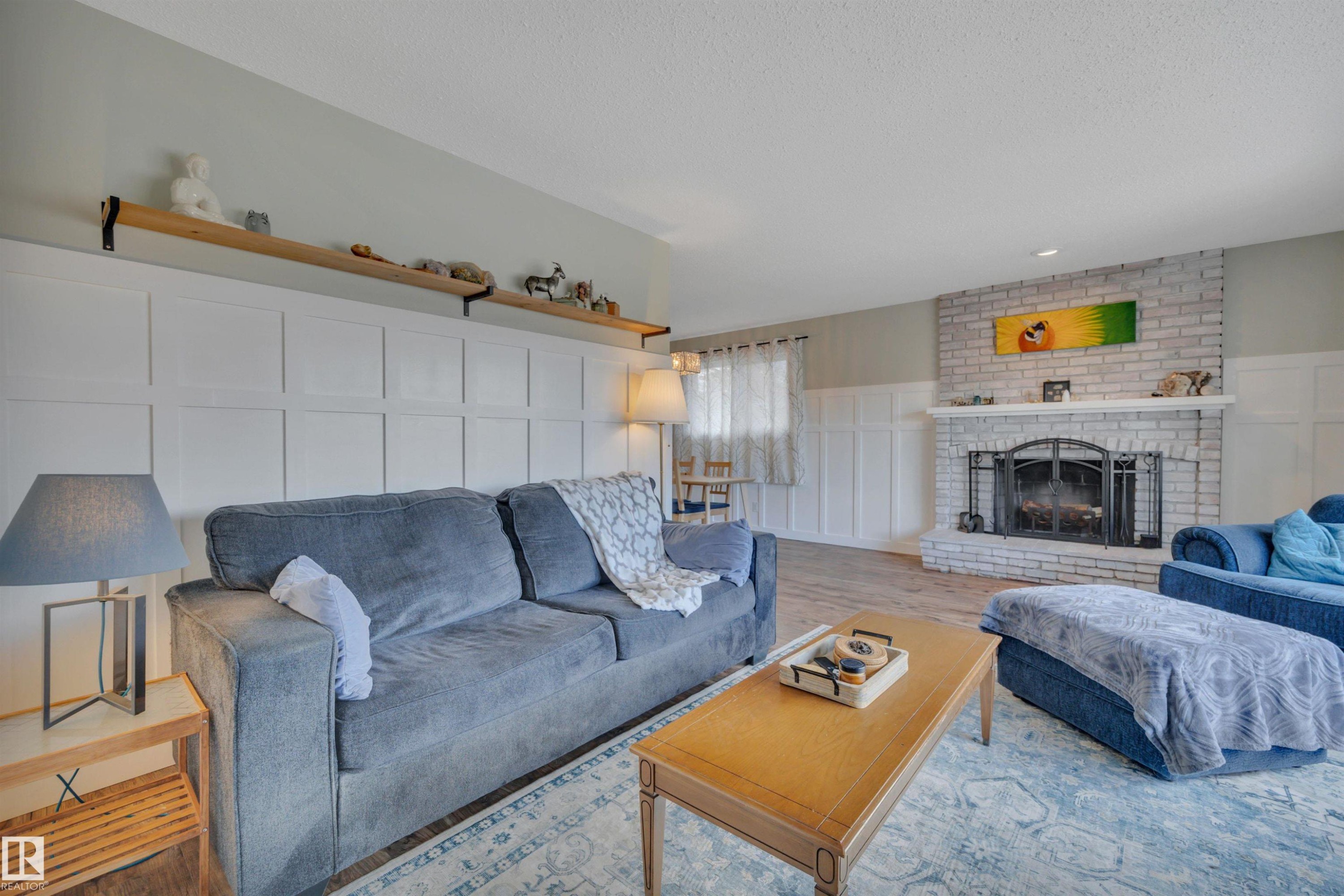 10435 39A Avenue, Edmonton, AB - Indoor Photo Showing Living Room With Fireplace
