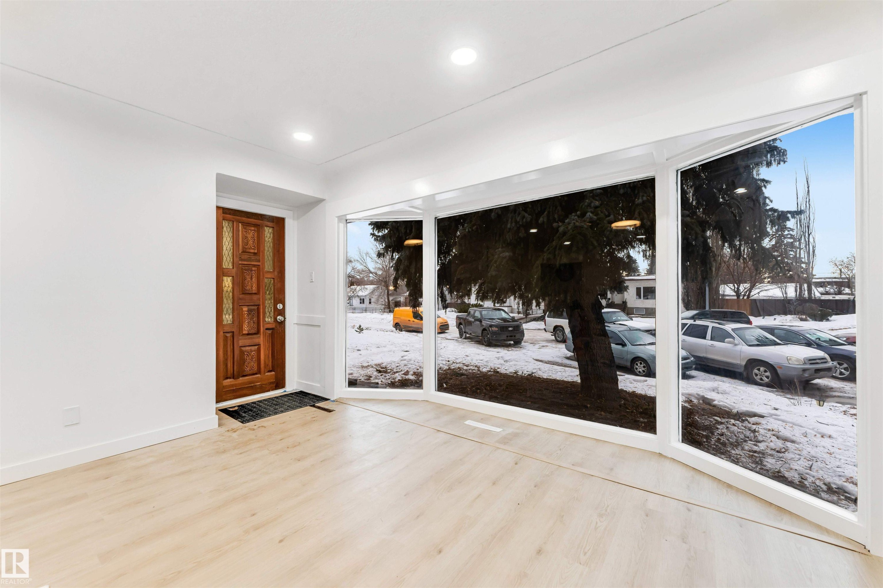 The property features light-colored flooring, white walls, and recessed lighting - 12423 91 Street, Edmonton, AB - Indoor Photo Showing Other Room