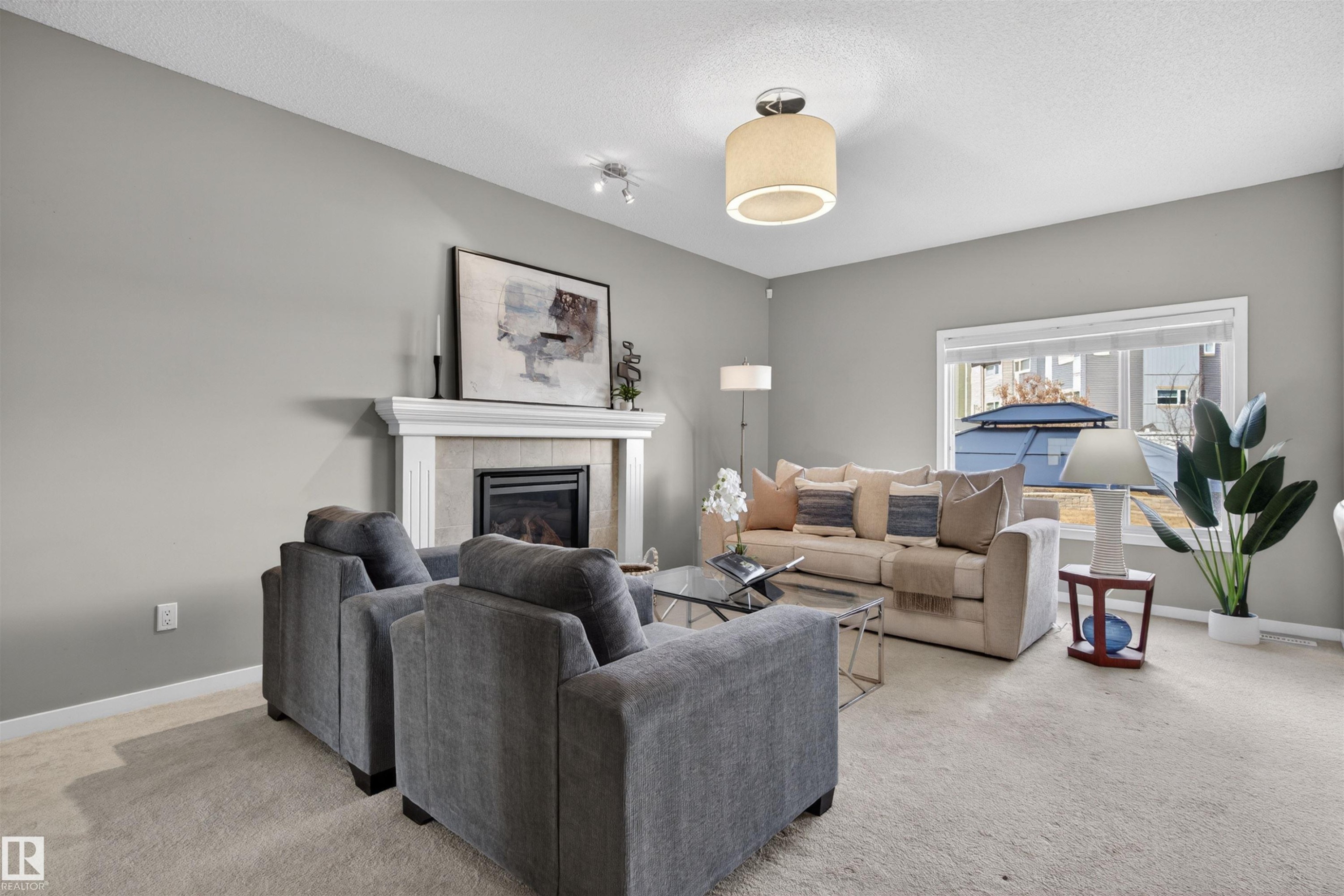 389 Simmonds Way, Leduc, AB - Indoor Photo Showing Living Room With Fireplace