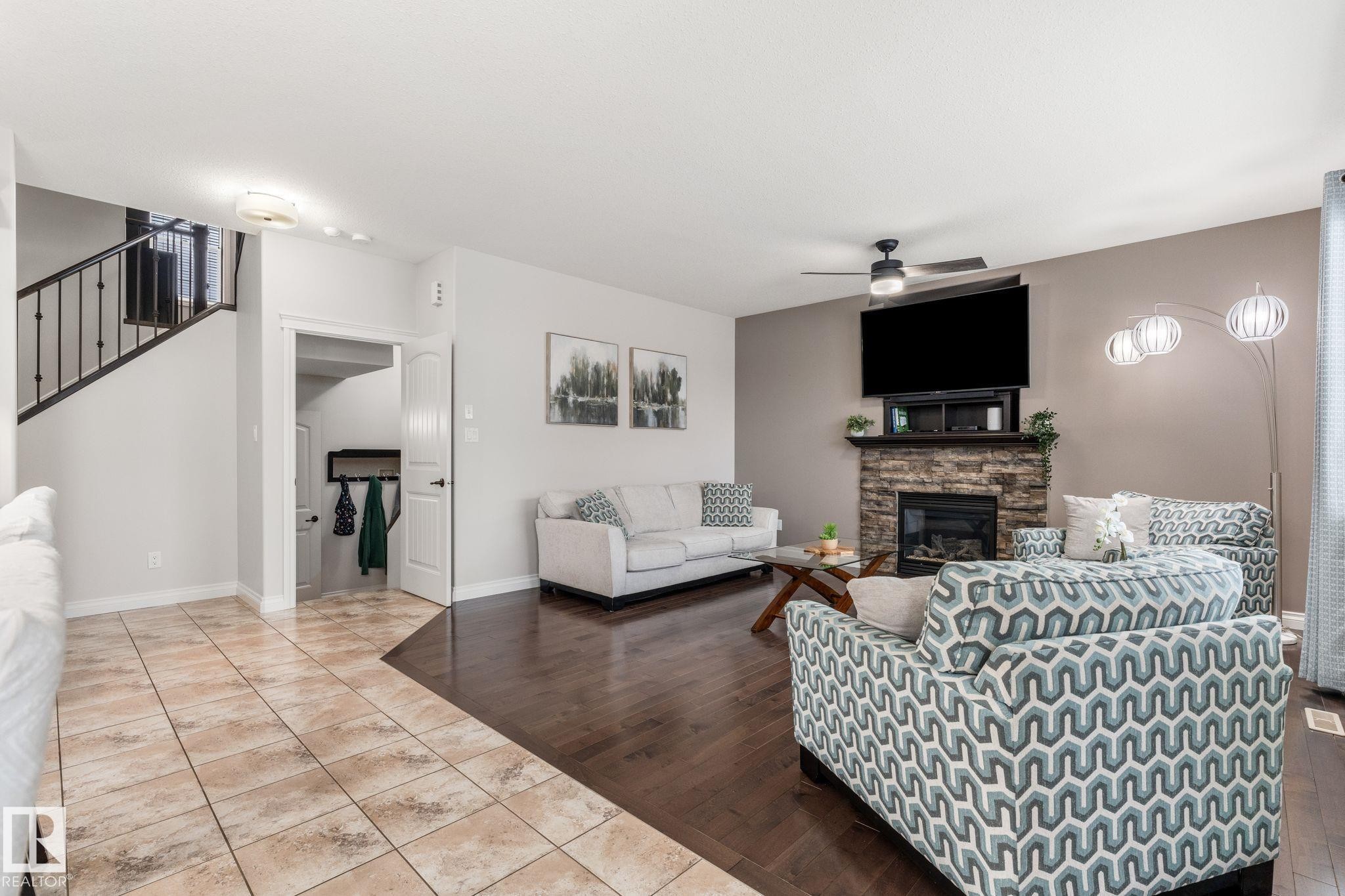 2 Longview Point(E), Spruce Grove, AB - Indoor Photo Showing Living Room With Fireplace