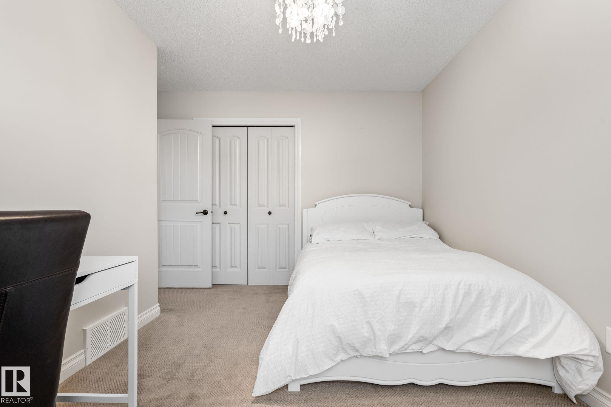 2 Longview Point(E), Spruce Grove, AB - Indoor Photo Showing Bedroom