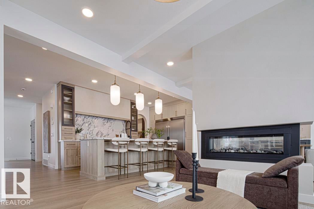 4551 Warbler Loop, Edmonton, AB - Indoor Photo Showing Living Room With Fireplace
